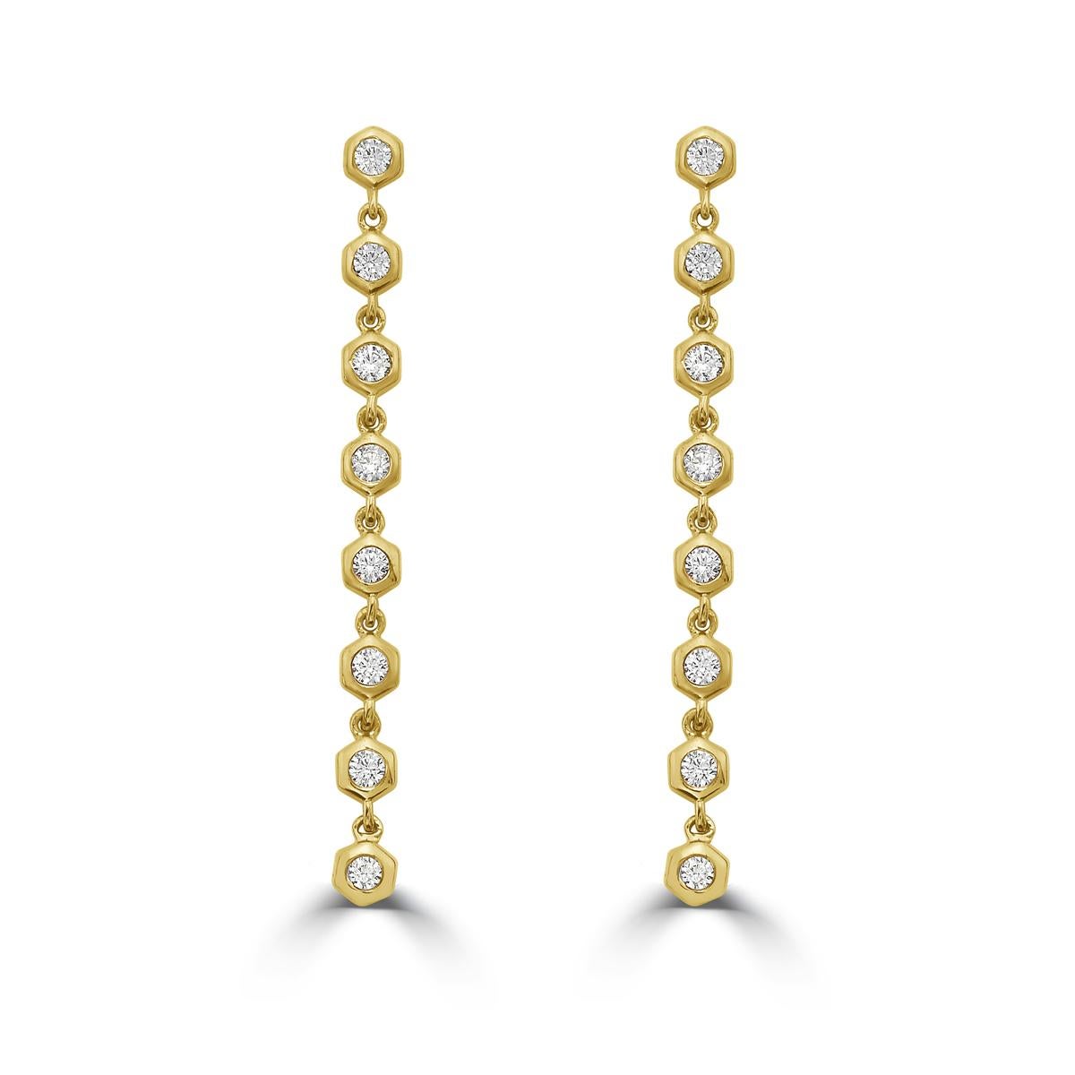 Discover the new classic in everyday fine jewelry. An updated twist to a classic piece, the Honeycomb Diamond Dangling Earrings is perfect for every day wear. Elevate your essentials and add elegance to your style with this design remix of a fine