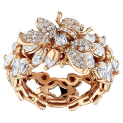 Wabenförmiger Ring aus Gold und weißen Diamanten im Baguette- und Birnenschliff