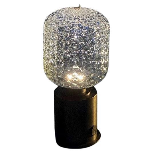 our honeycomb portable lamp creates poetic projections, it evokes a unique and captivating display of light and shadow. 

Description: portable USB table lamp LED, rechargeable
Color: crystal and bronze
Material: bronze and glass

Brightness