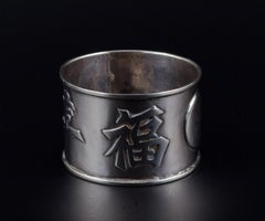 Hong Kong silver, napkin ring and salt shaker in silver. Approx. 1920/30s.