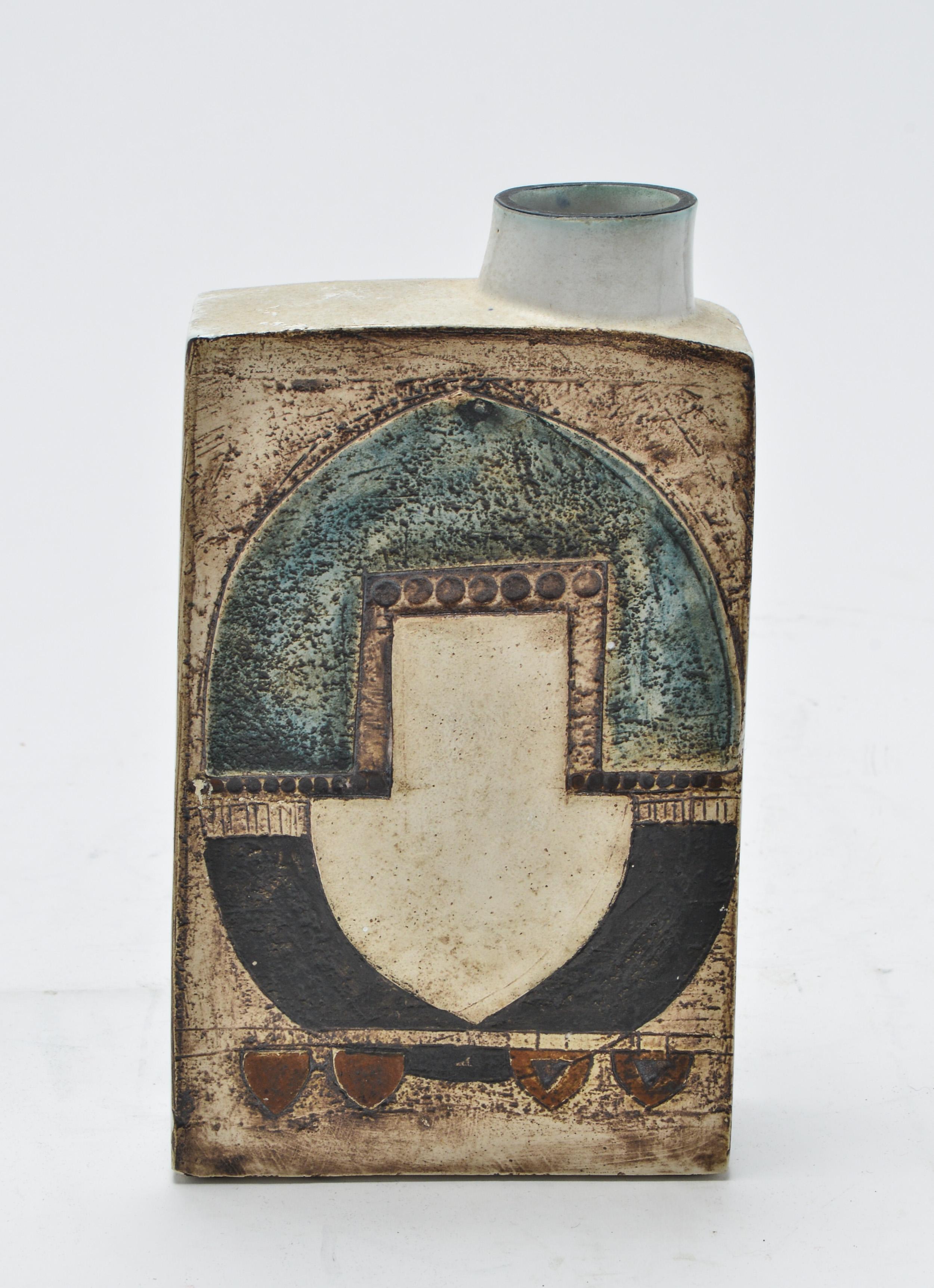 Mid-Century Modern chimney vase designed by Honor Curtis for Troika St. Ives pottery. The piece was made circa 1960, with arrow design to the body. Inscribed and signed 