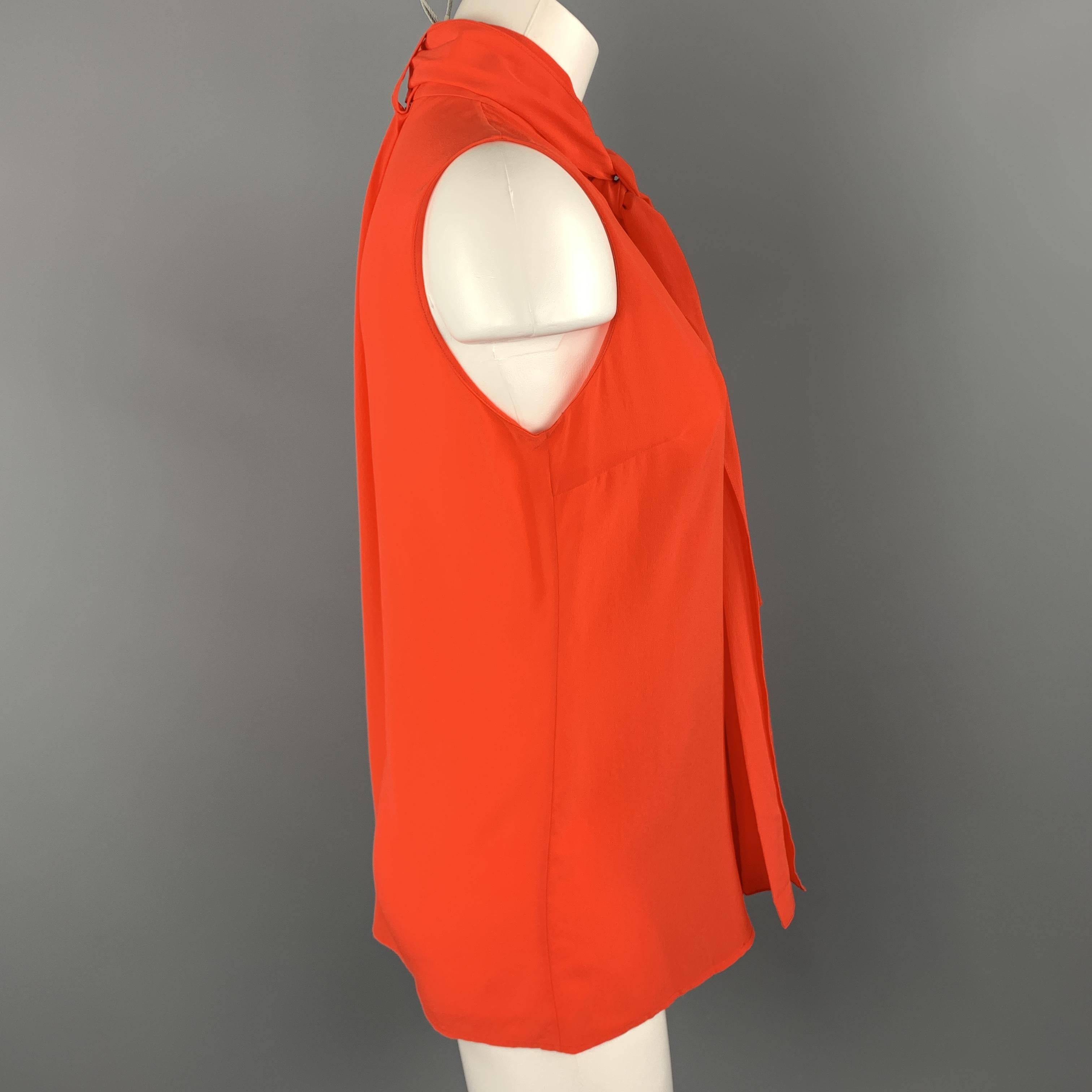 red silk sleeveless blouse