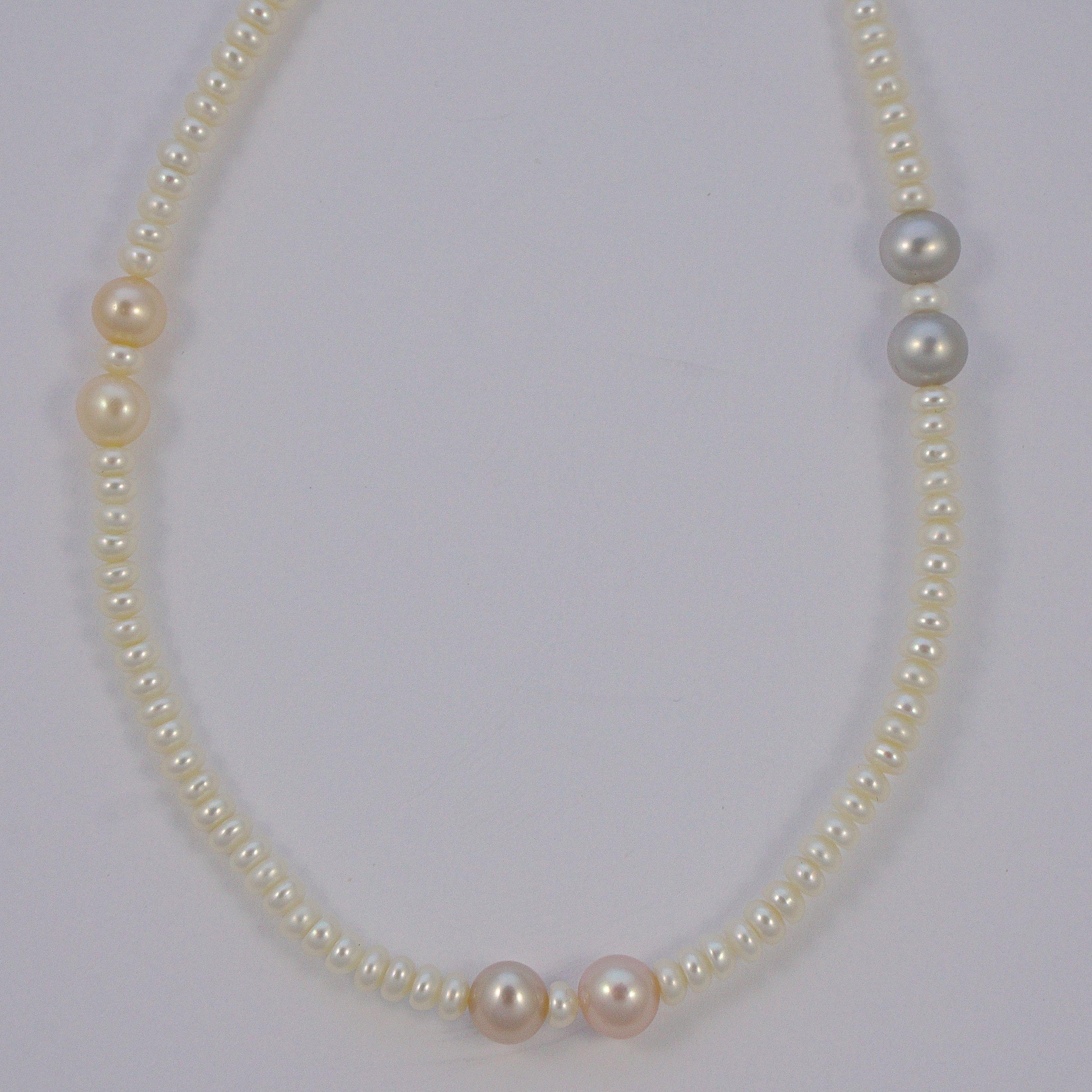 Wonderful Honora strand of white cultured pearls, with larger pearls in grey, peach and pink. The necklace is length 87cm / 34.25 inches, the large pearls are 6mm / .23 inch, and the small white pearls are width 4mm / .15 inch. There is no clasp, so