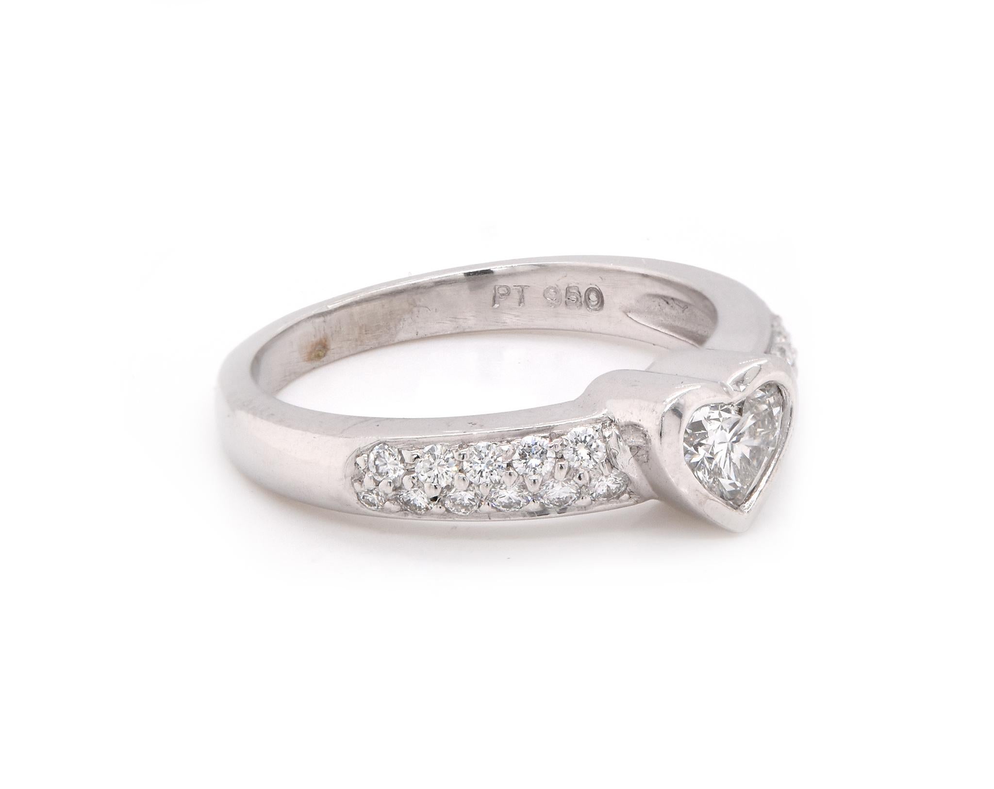 Material: Platinum 
Center Diamond: 1 heart cut = .45ct
Color: G
Clarity: VS2
Diamonds: 22 round cut = .33cttw
Color: G
Clarity: VS2
Ring Size: 7.5 (please allow up to 2 additional business days for sizing requests)
Dimensions: ring shank measures