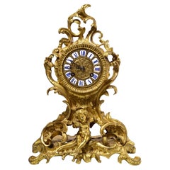 Honoré Pons French Rococo Gilt Bronze Clock 19th century Figural Putto