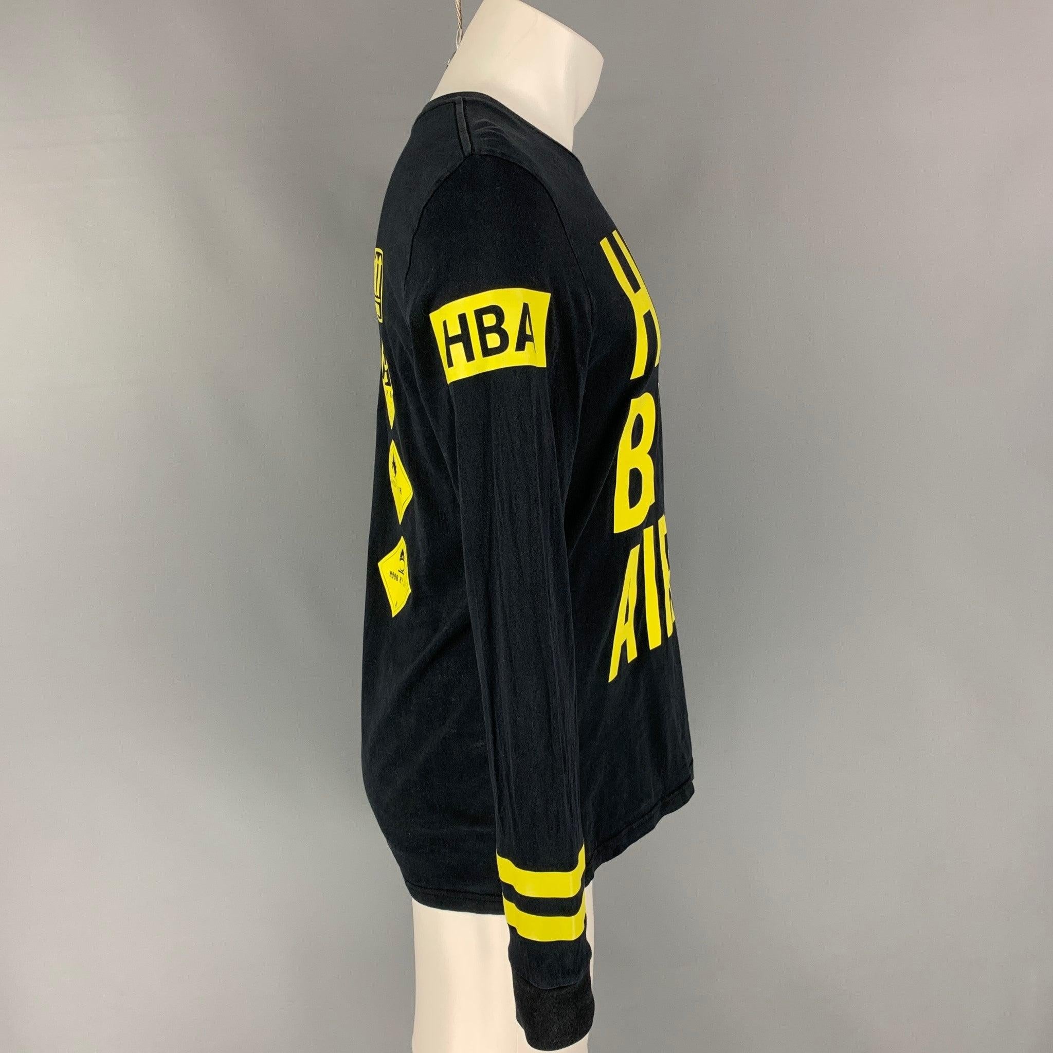 HOOD BY AIR pullover t-shirt comes in a black & yellow logo cotton featuring long sleeves ad a crew-neck.
Very Good
Pre-Owned Condition. Fabric tag removed.  

Marked:   Size tag removed.  

Measurements: 
 
Shoulder: 17 inches  Chest: 38 inches 
