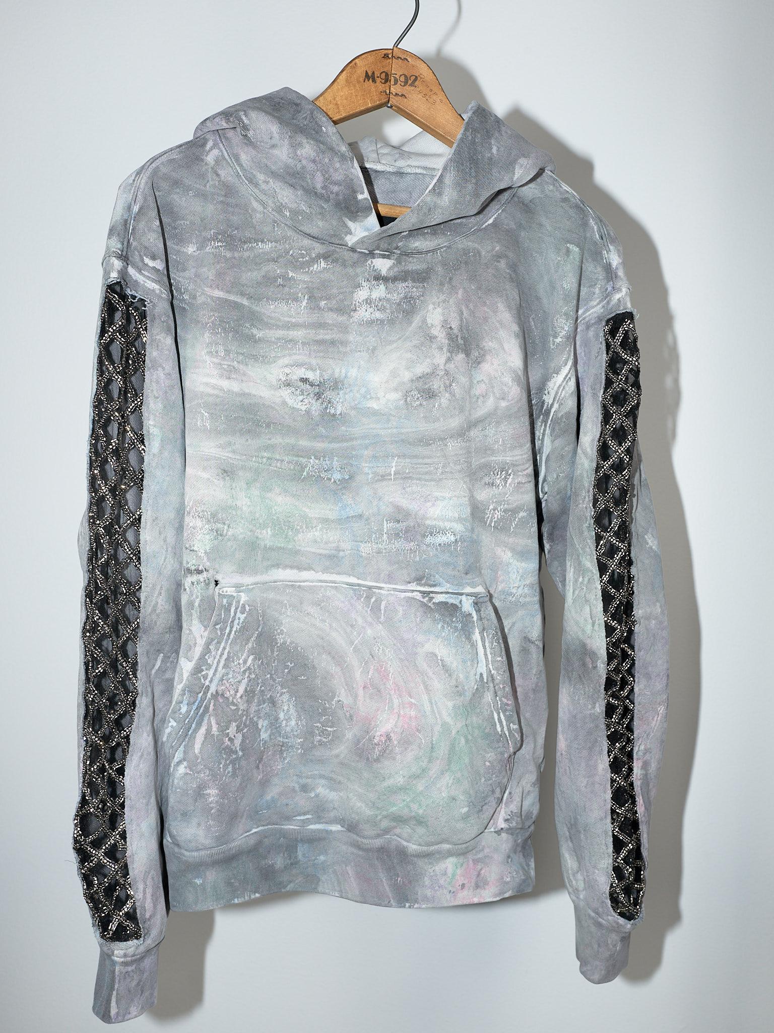 Brand: J Dauphin
Embellished J Dauphin - Grey Marble Dye with Light Pastel Undertones Hoodie
Material: 100% Organic Cotton 
Embellished Sleeve

J Dauphin was created 2006 by Swedish French Johanna Dauphin. She started her career working for LVMH