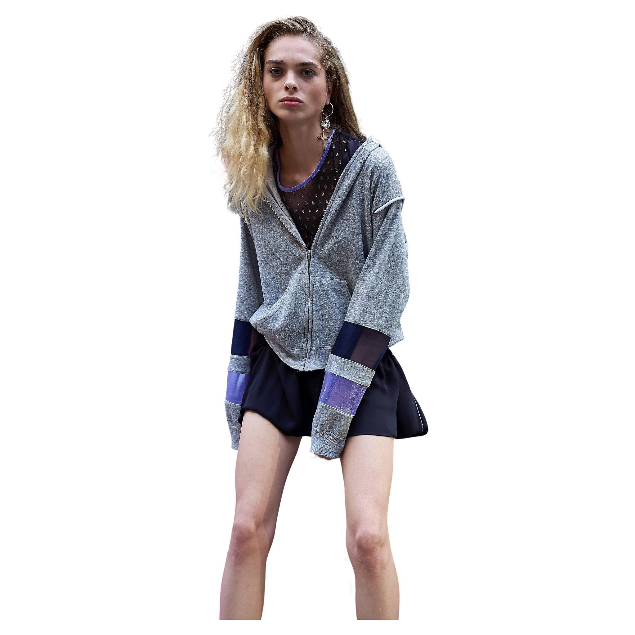 Brand: J Dauphin
One of a kind 
Embellished J Dauphin - Gray Zipr Hoodie Organza Inserts Lilac Silk Organza and Italian LightBlue 100% Silk Details
Material: 50/50 Cotton  of Jersey, Silk 100%
Embellished Sleeve with Organza Details
Hoodie from the