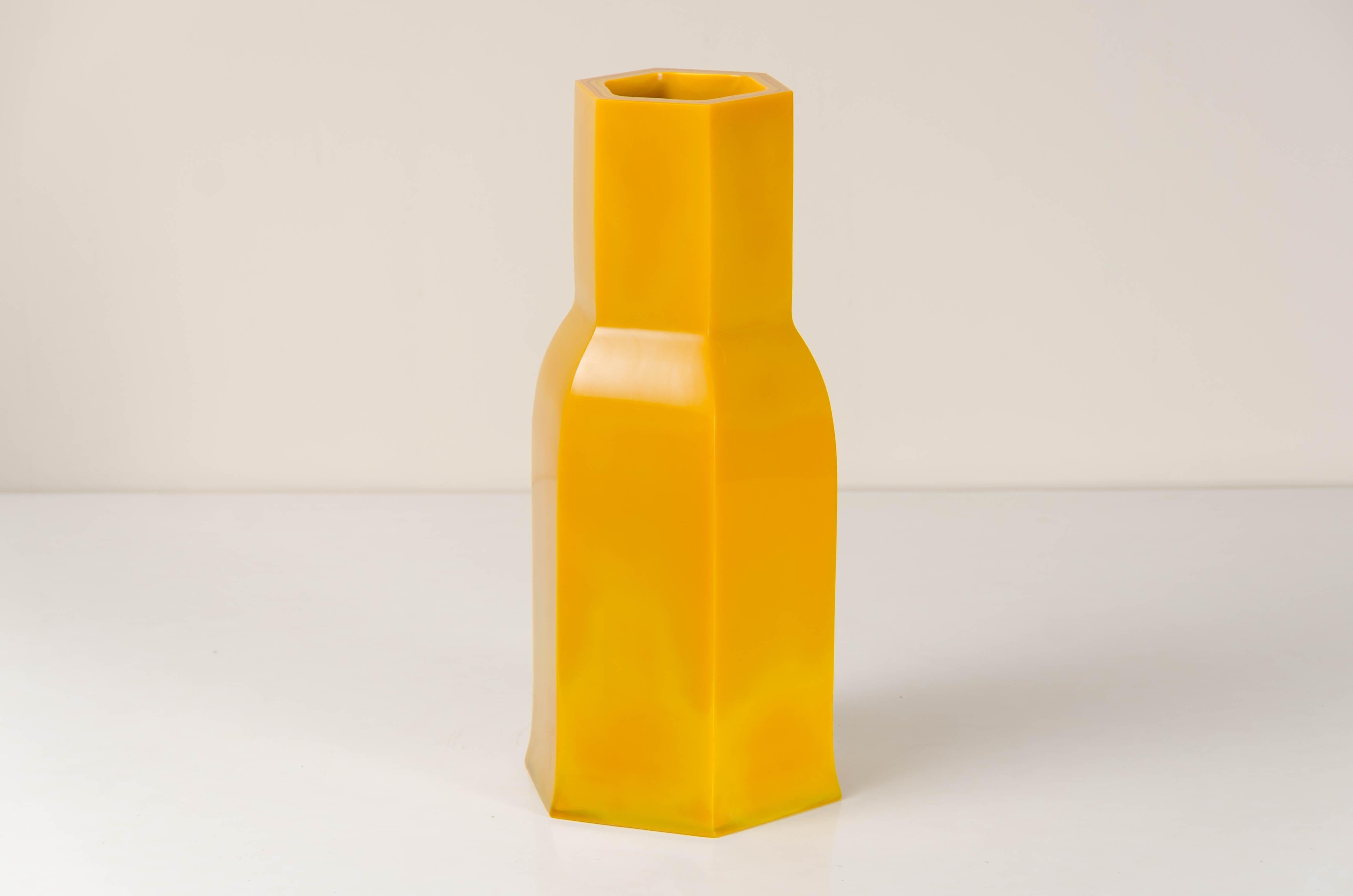 Hoof vase
Yellow peking glass
Hand blown glass
Hand carved
Limited edition

Peking glass refers to the high-quality glass art produced by the imperial and commercial workshops in Beijing during the Ching Dynasty, China 1644-1911. Since then,