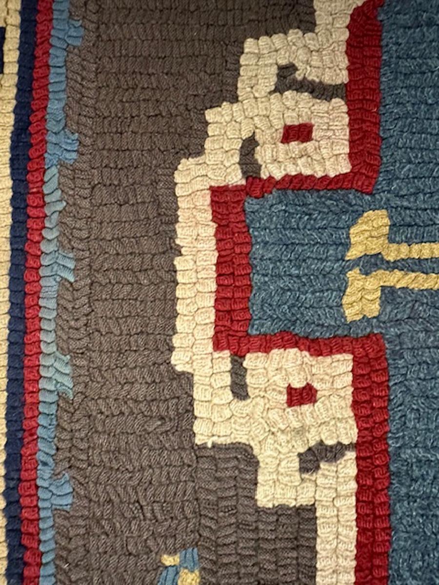 Hooked rug from Europe possibly Germany

Age: circa 1920

Size: 3′.3″x2′.3″ (99×69 cm)

This oriental rug design hooked rug shows an aubergine field centered by an elaborate ivory,red and blue cartouche enclosing two brick color medallions with
