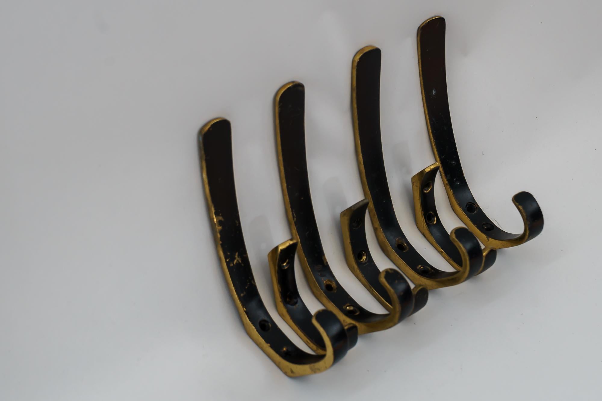 Hooks by Hertha Baller, circa 1950s
Original condition
Big hooks: 
H 15cm 
W 2cm
D 10cm

Small hooks:
H 7.5cm
W 1.5cm
D 6cm.
