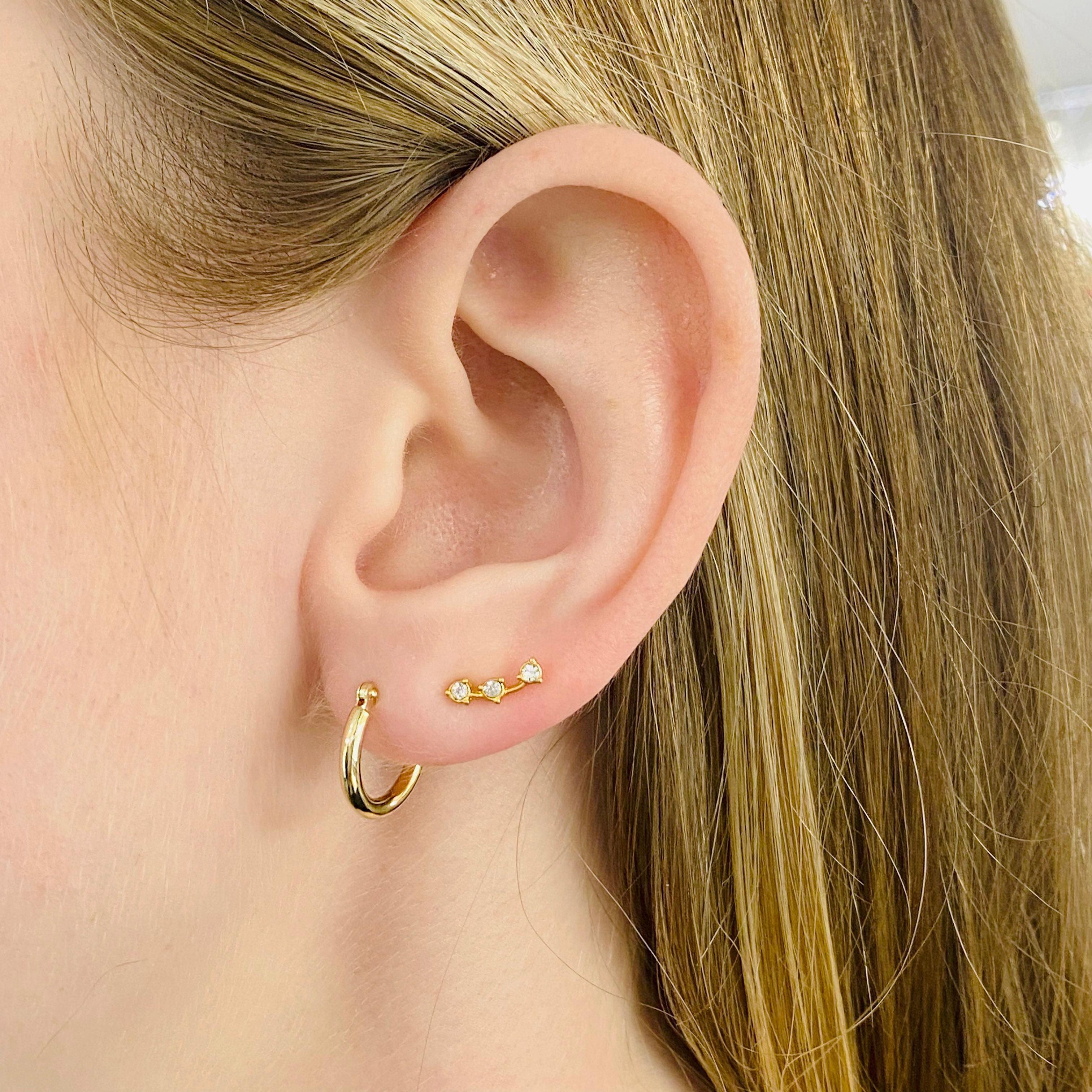 These 14 karat yellow gold hoops are perfect for everyday wear! They are made of hollow gold so that they will be light on your ears and not pull down your earlobes. We have seen many people who have their earlobes rip because they are wearing too