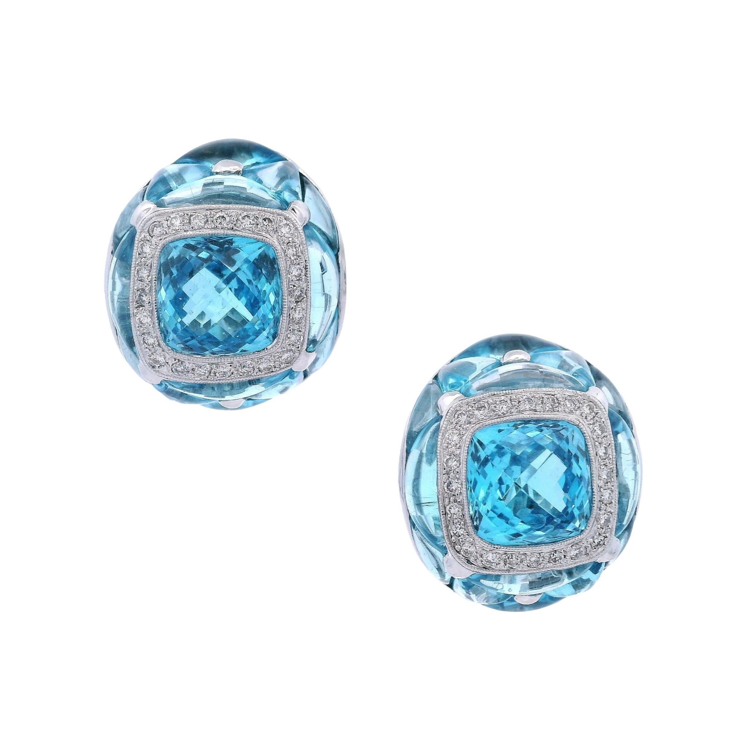 Orecchini a cerchio in oro bianco 18kt con topazio blu e diamanti