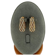 Orecchini a cerchio in oro rosa e bianco con diamanti