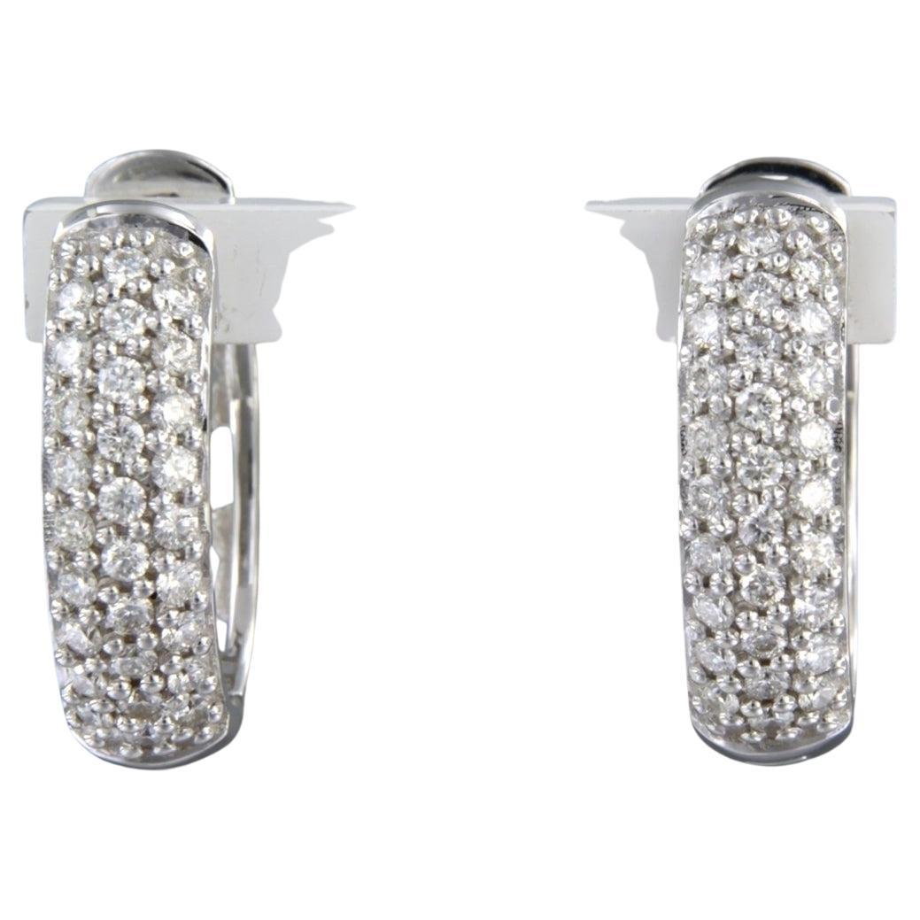 Boucles d
oreilles avec diamants taille brillant jusqu
à 1,26ct Or 18k 12,4 grammes en vente