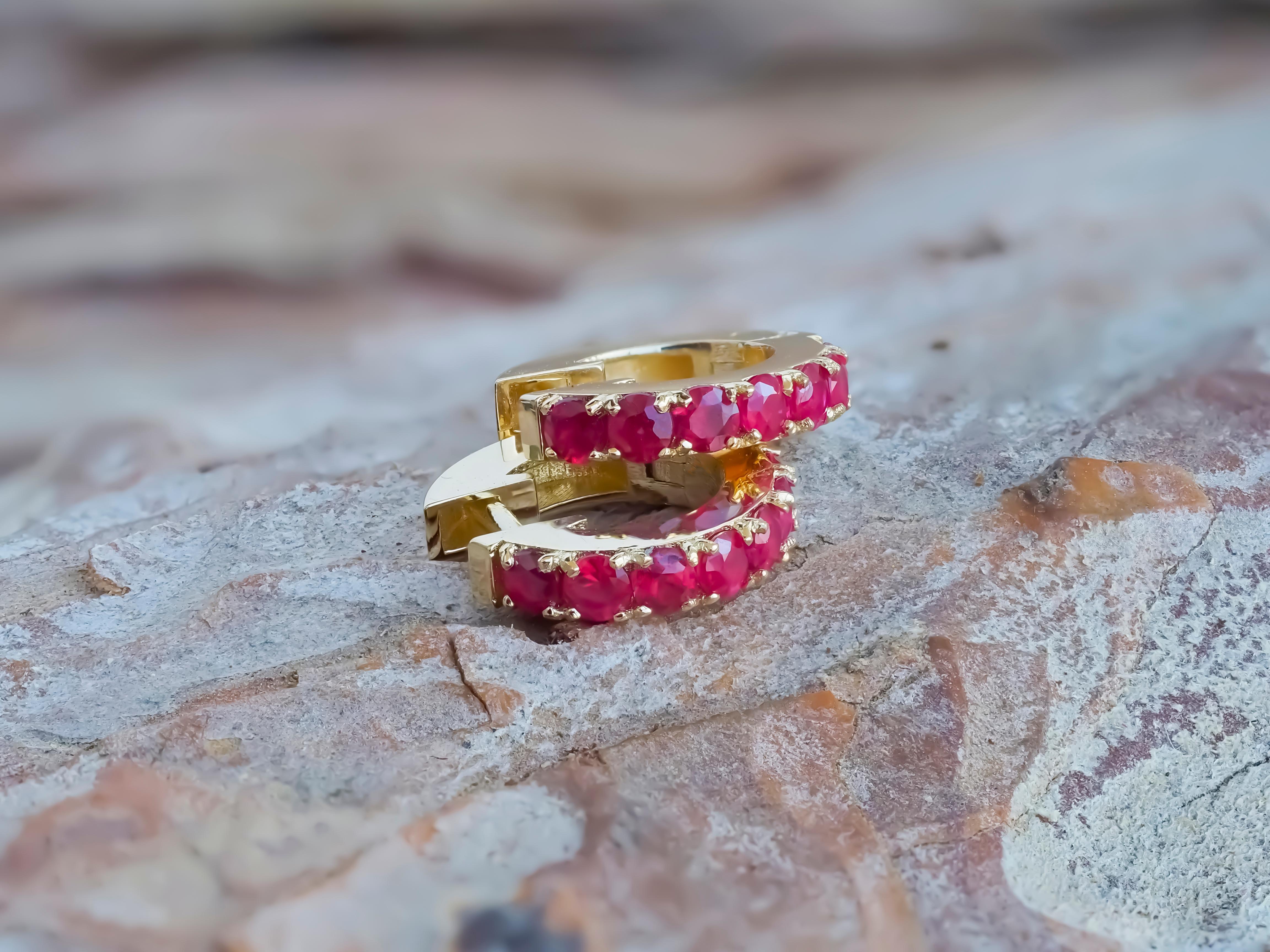 14 k gold hoop earrings with rubies
Metal: 14kt solid gold
Earring size: 12 mm.
Weight: 2.50 g.

Gemstones:
Rubies: 14 piece, round cut,red  color, transparent, approx 0.56 ct. (0.04x14)

💍Processing time for custom item takes: 5-7 working days.
💍