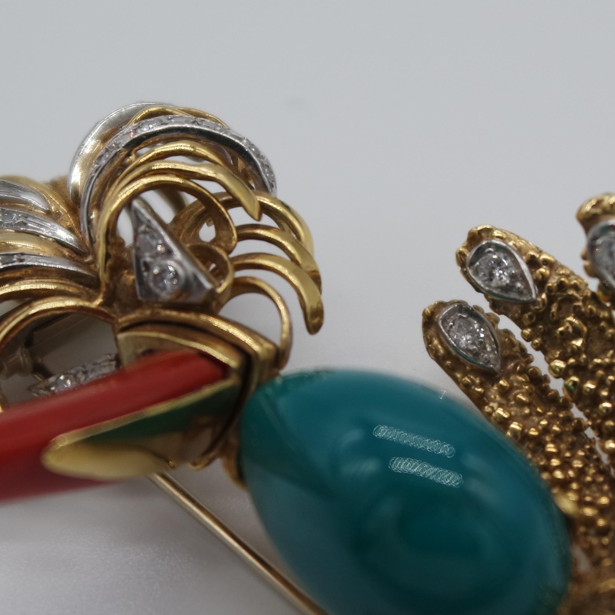 This brooch is an original creation depicting an hoopoe with a red Mediterranean coral beak, a cabochon turquoise body and some round brilliant together with  huit huit cut diamonds. The creative work is gorgeous and ironic, and we believe this