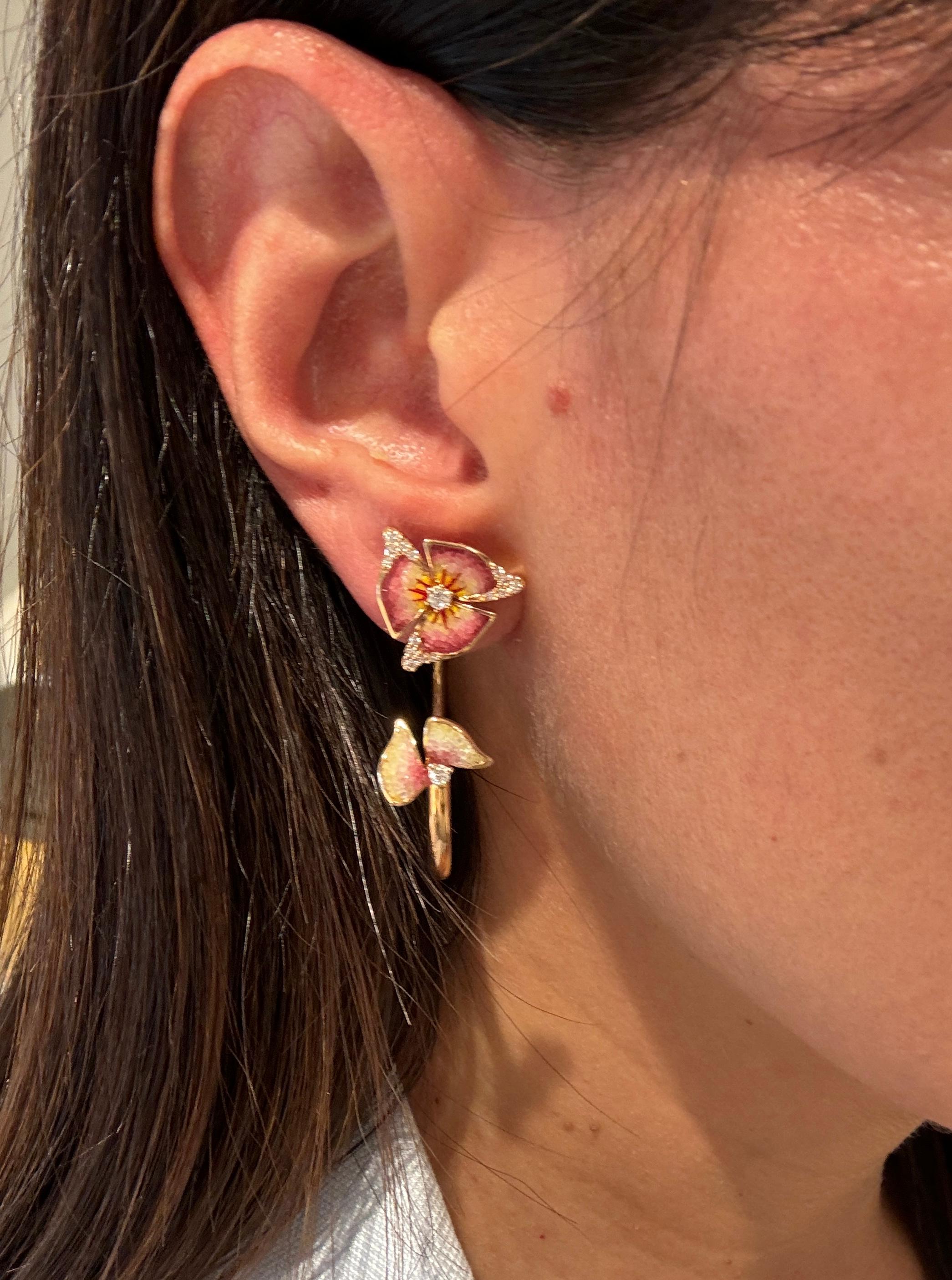 Our exquisite hoop earrings, adorned with delicate pink and yellow mosaics, are reminiscent of the first light breaking through at dawn.
Each mosaic is meticulously arranged to mimic the palette of a sunrise sky with soft pinks and radiant yellows.