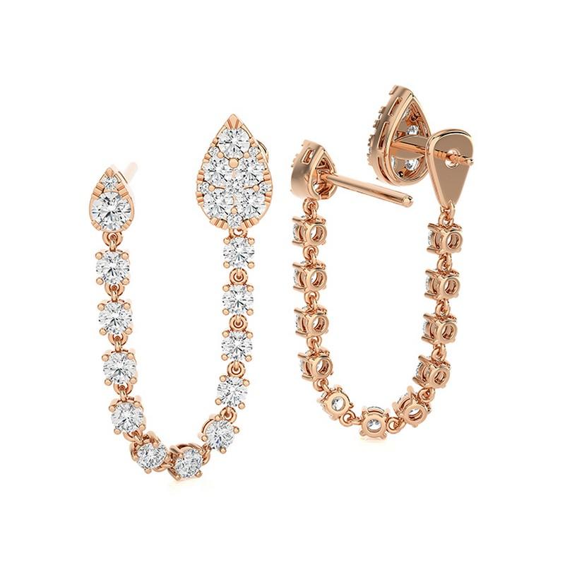 Overview:
The Hoops & Huggies Long Earrings are a luxurious pair crafted in 14K rose gold. Featuring an impressive 2.91 carats total weight of round diamonds, these earrings are designed to make a statement and add a touch of glamour to any