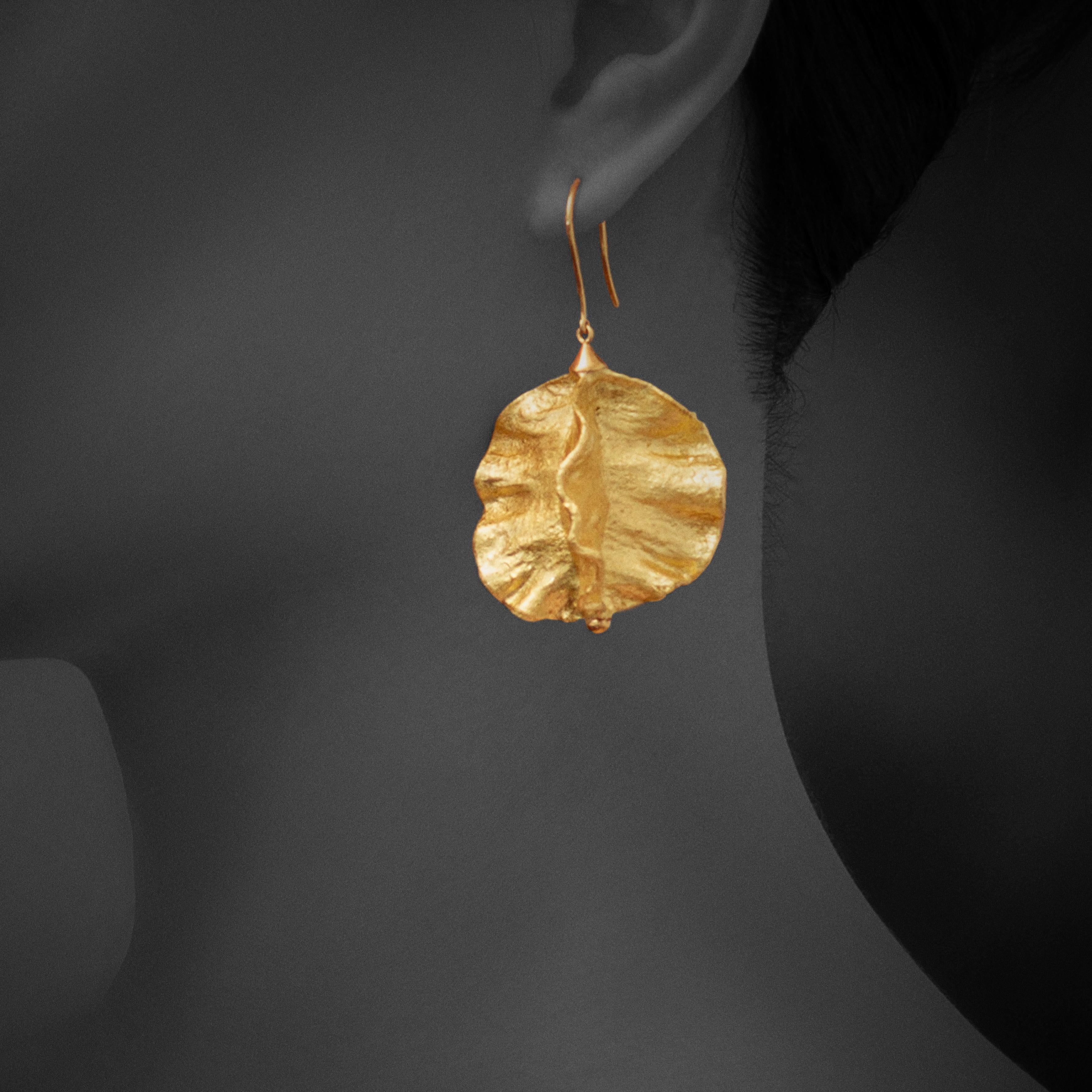 Hand-crafted earrings designed with the inspiration of blooming flowers covered in 24K Gold Leaf. 

The hooks are 9K pink gold.

Note : Production Lead Time is 2 months if item is out of stock.
           Due to the nature of raw materials used the