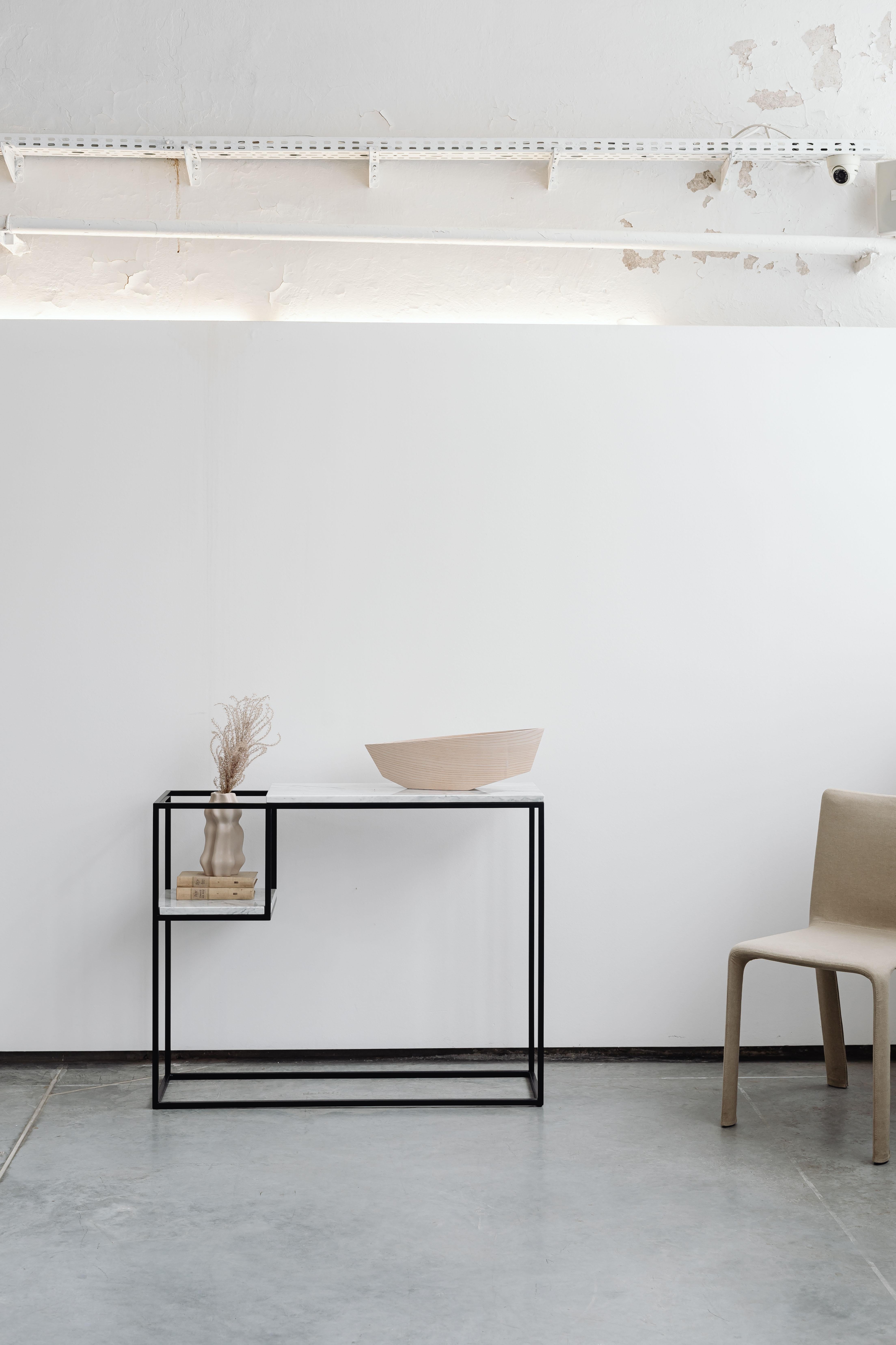 Hop Maxi Console Table by Un’common
Designed by Małgorzata Korycka.
Dimensions: D 30 x W 100 x H 80 cm.
Materials: Steel and Carrara marble.

Available in different marble options. Please contact us.

The HOP MAXI console has a marble top on a steel