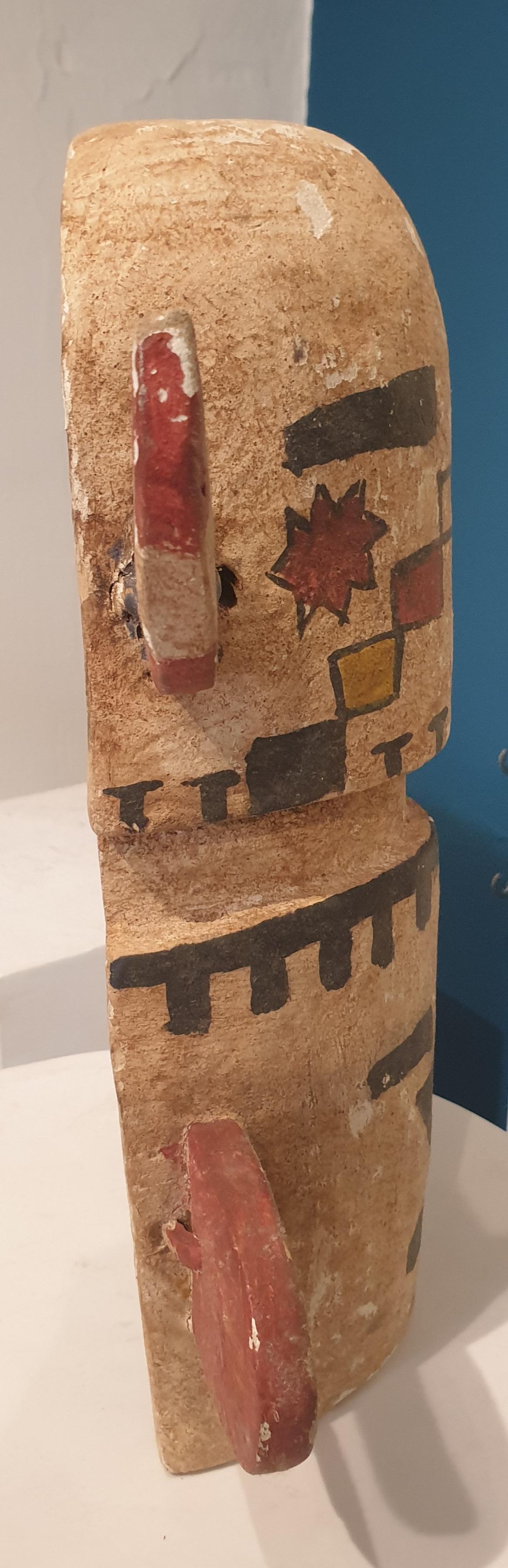 Native North American carved cottonwood root and painted Hopi mask.

In Arizona, Hopi Indians wear masks and costumes to dance to the beat of drums in rituals that call on the spirits to regulate rain and ensure a good harvest.

The Hopi invoke the