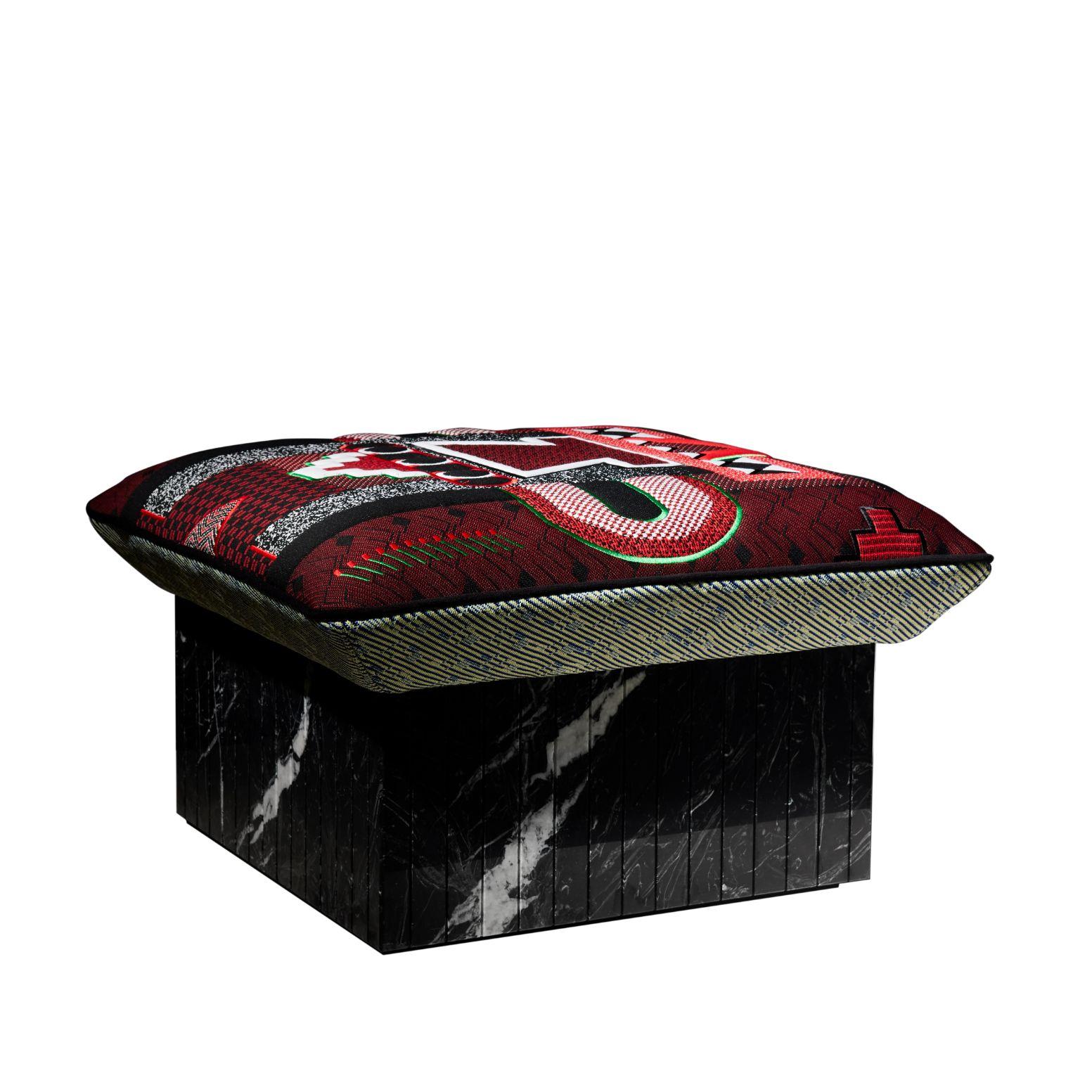 Hopi Ottoman red pattern by Marta Bakowski
Dimensions:D65 x W65 x 44 cm
Materials: Marble and fabric.
Also available in different finishes.

HOPI, this new collection of ottomans inspired by Native American Indian culture, is made of a very special