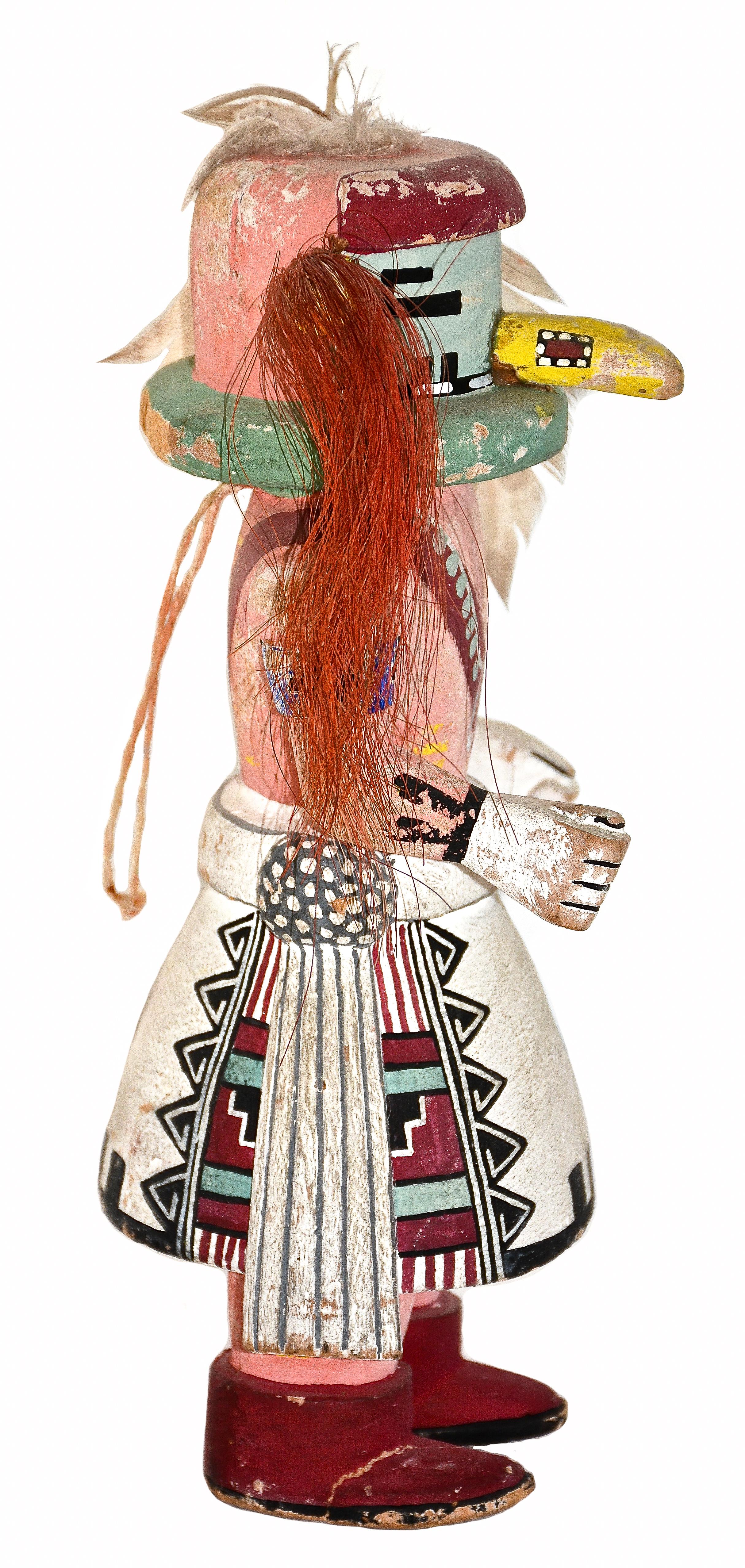 Tasaf Katsina
Hopi
1940s
10 inches H. x 4.50 inches W. x 3.75 inches D.
Cottonwood root, mineral pigments, dyed horsehair, feathers. 
Very good original condition overall.

An wonderful example of the Hopi Tasaf Katsina circa early to mid