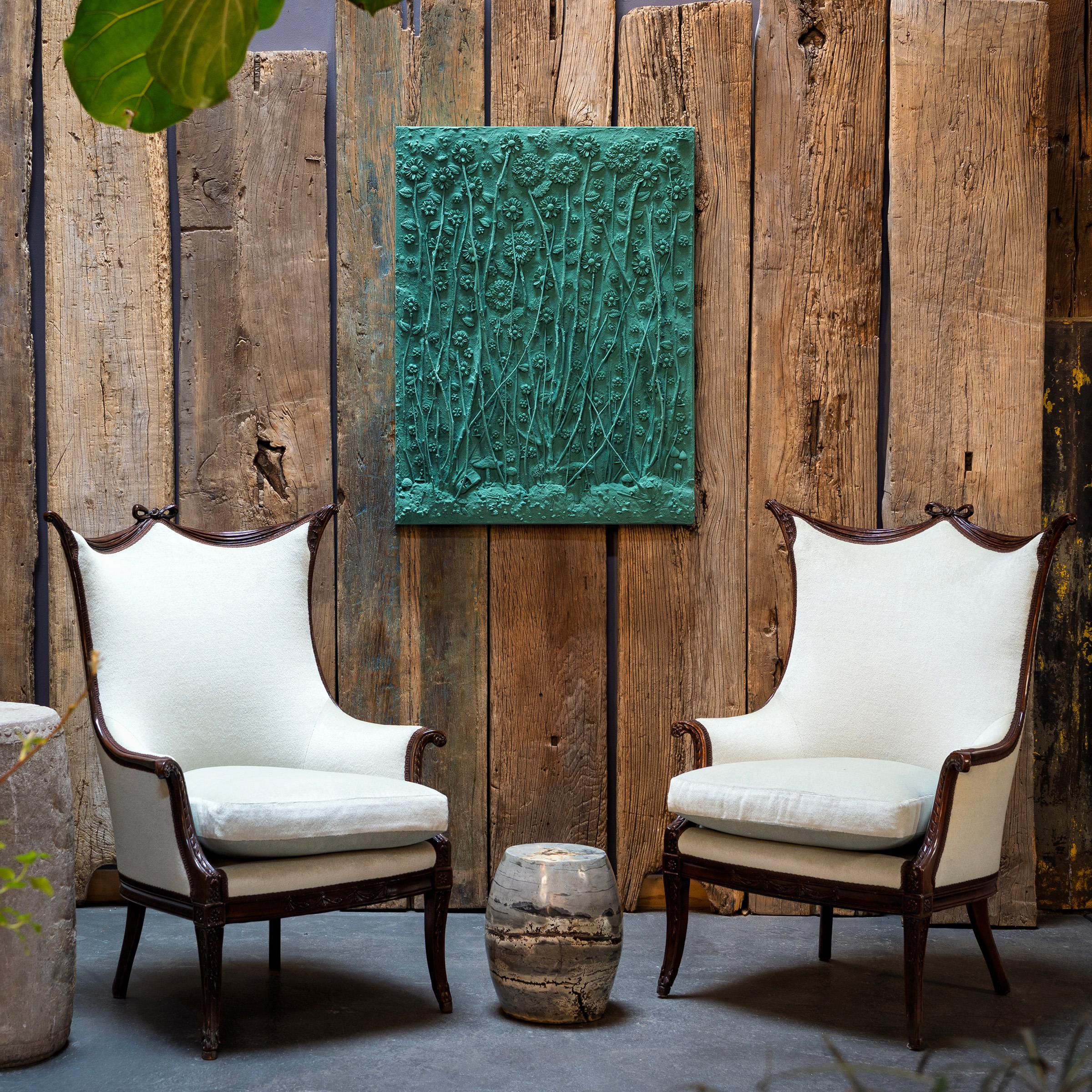 As if blotted with ink and brushed with calligraphy, this polished painting stone drum from Guangxi province is marked with swirling patterns of dark and light. Selected for its organic patterning and subdued color, the low table was sculpted from a