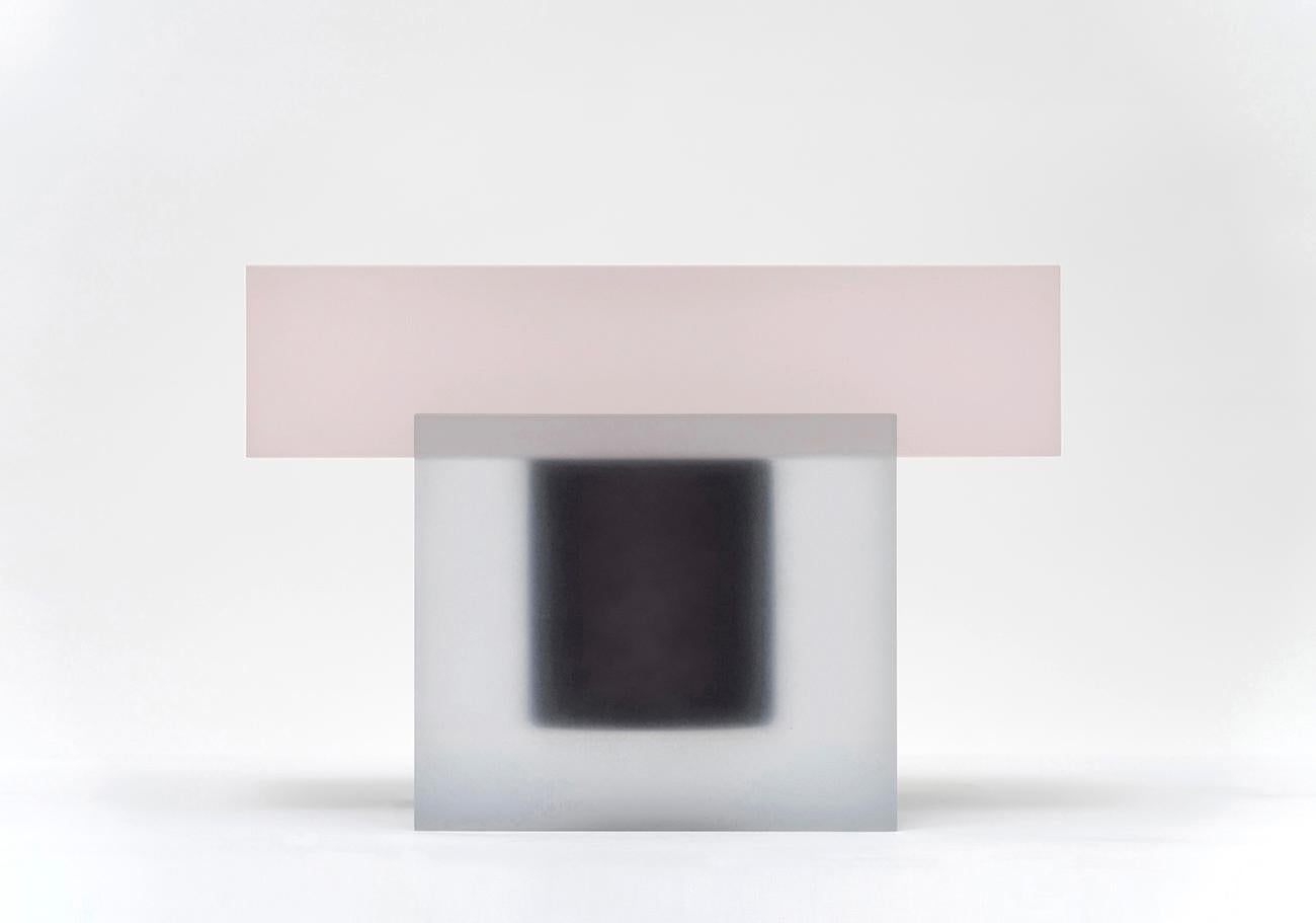 The 'Horizon' series by Rahee Yoon is a collection of architectural furniture that evolves from her earlier Block series, transitioning from sculptural objects into functional furniture. This series features a horizontal line at the blurred boundary