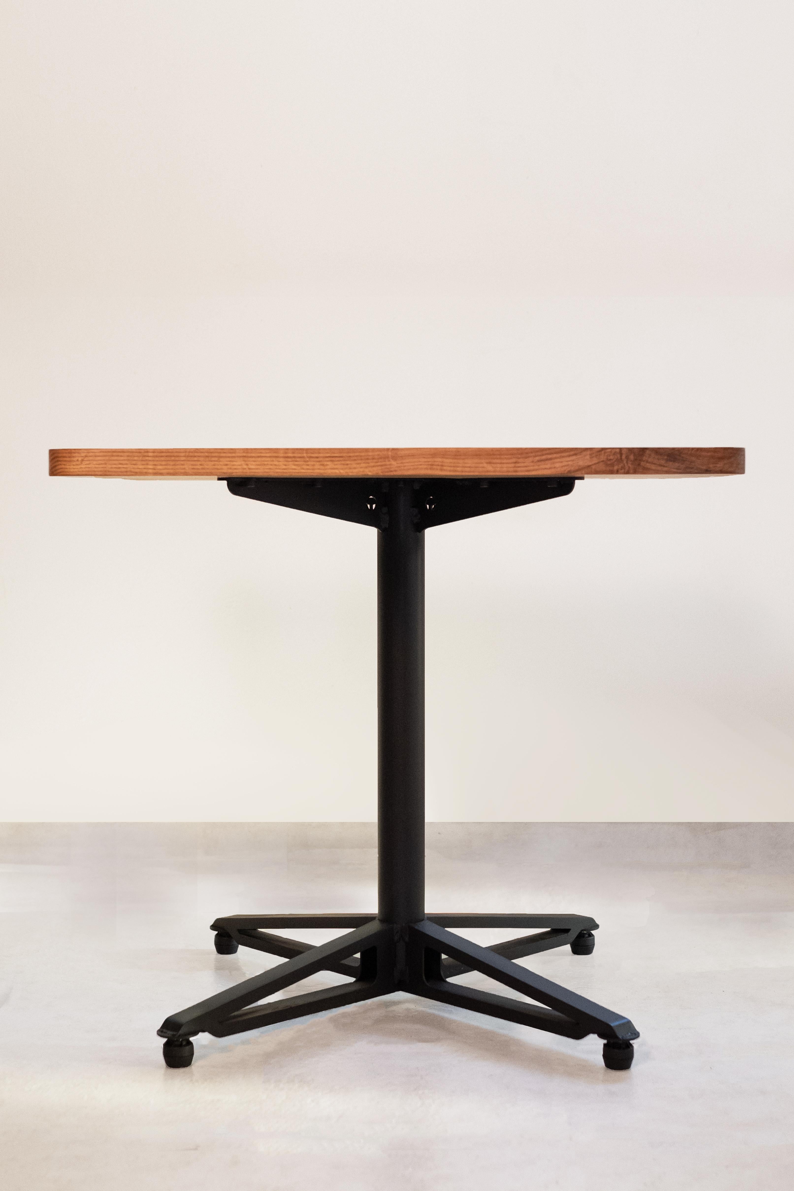 Industrial Horizon Table with wood table top and black mild steel base For Sale