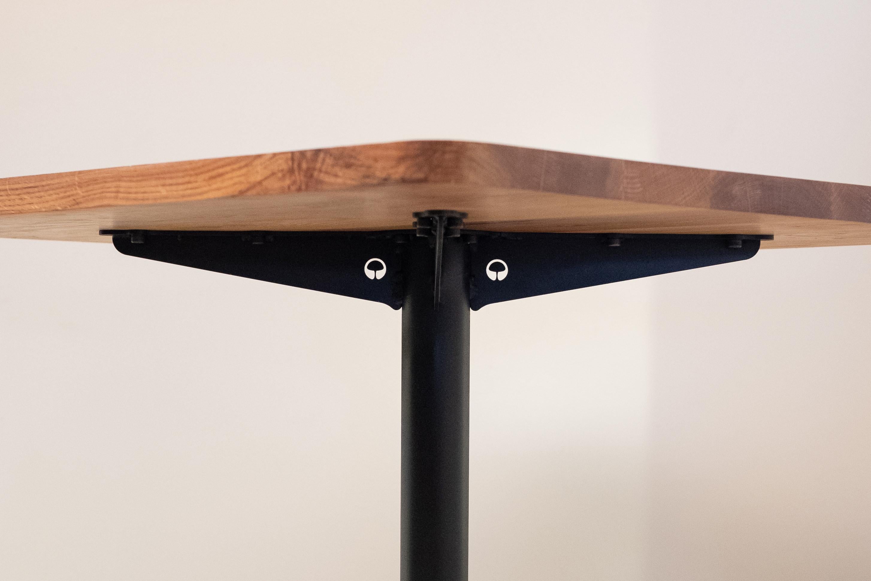 South African Horizon Table with wood table top and black mild steel base For Sale