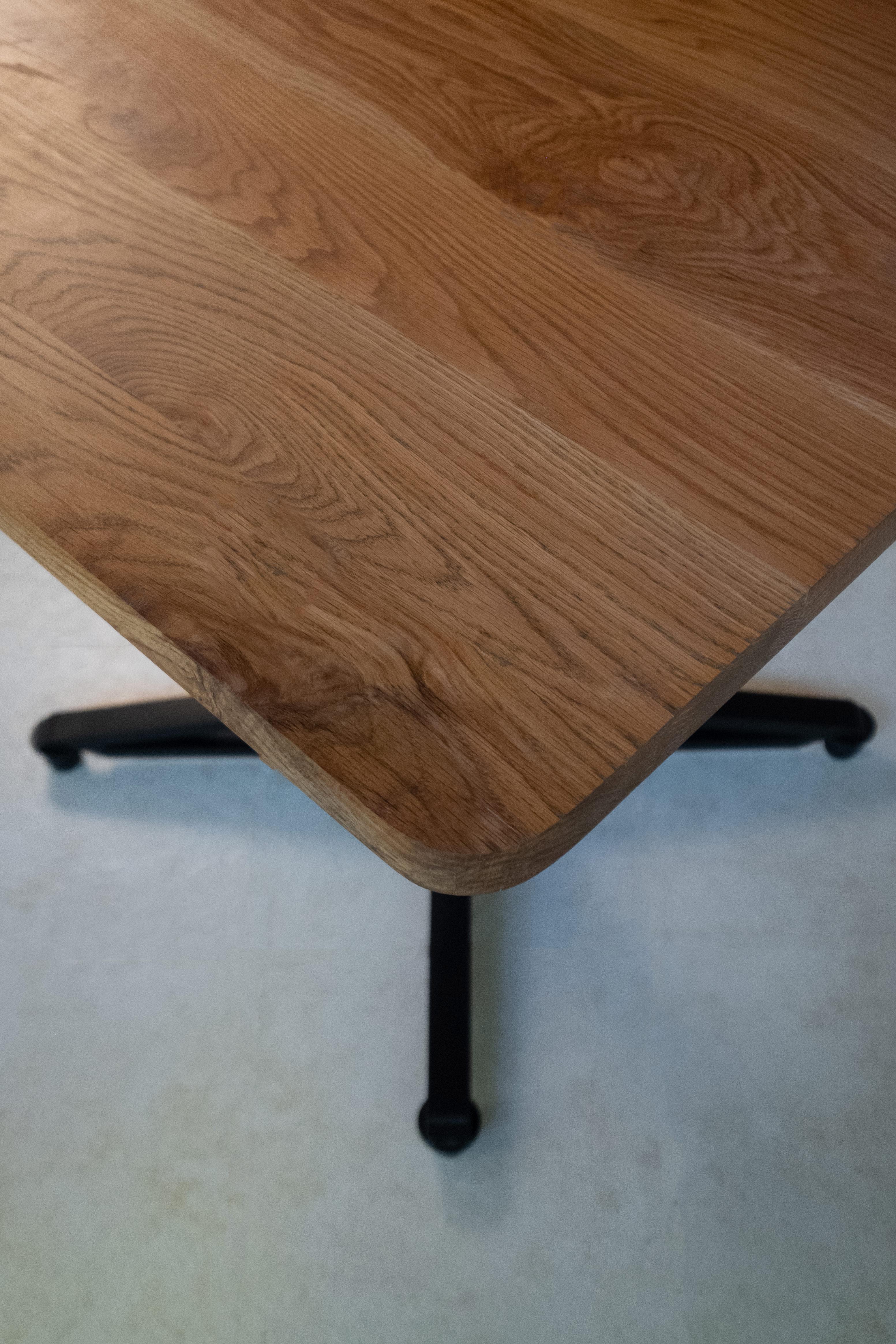 Oiled Horizon Table with wood table top and black mild steel base For Sale