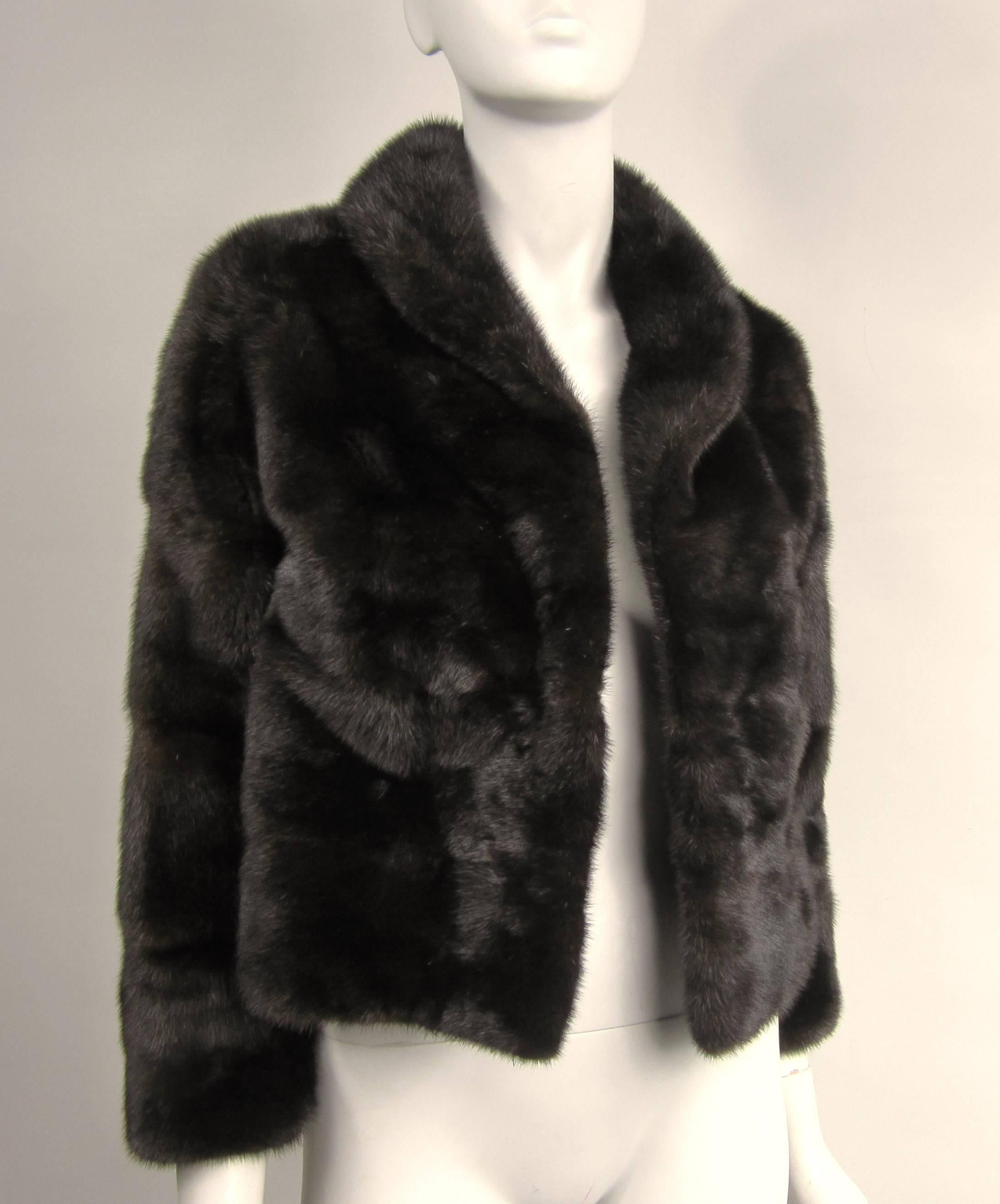 Lux pelts wrap around this petite Ranch Jacket By M Blaustein.Soft and supple minks, no issues. The Jacket has no pockets or closures, would look amazing with jeans as well as that little dress. From a furrier based in Short Hills NJ M Blaustein.
