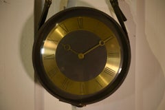 Orologio in pelle e lino di Jacques Adnet degli anni 50
