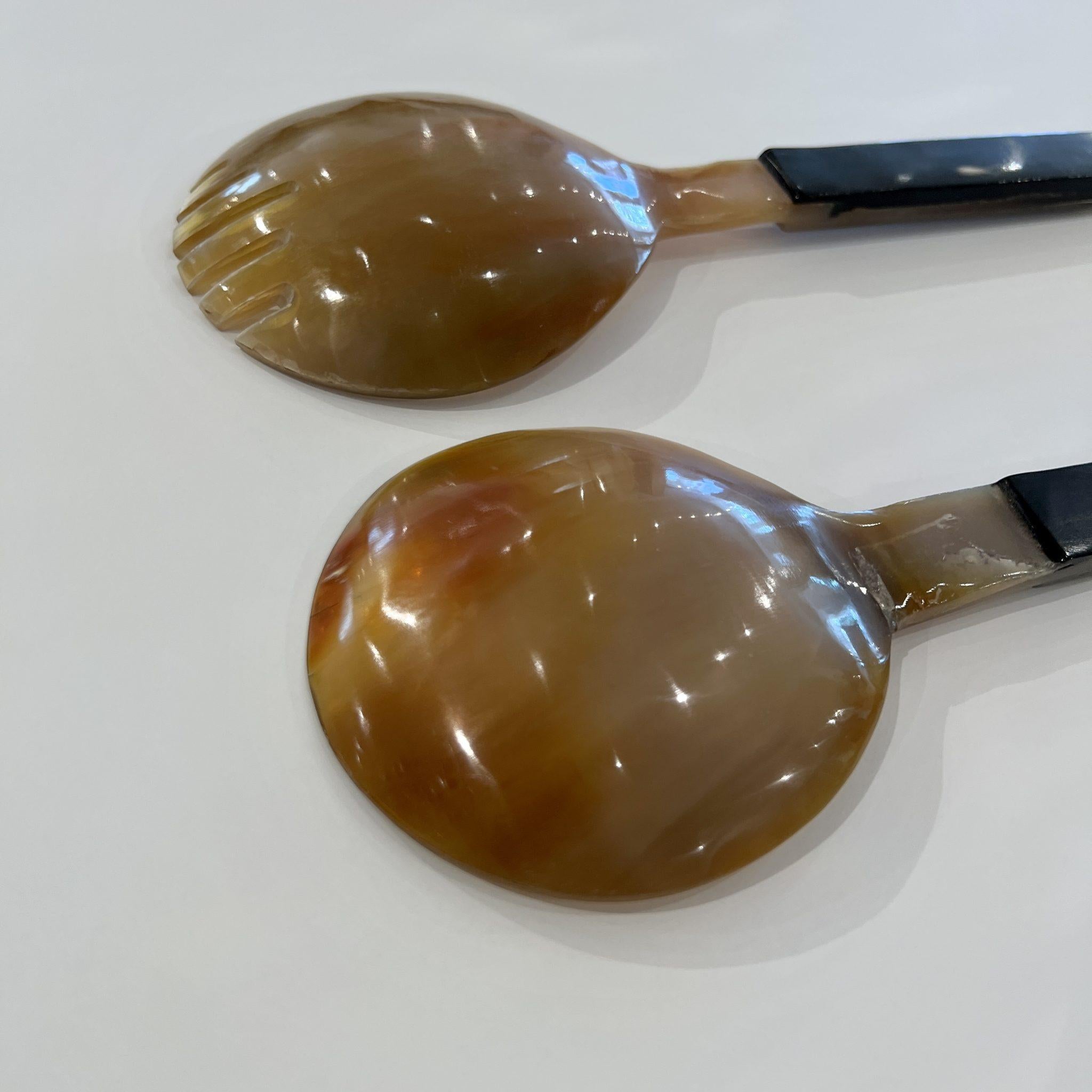 Bold and organic. These carved bone serving spoons or salad tossers are beautifully designed and ultra practical.