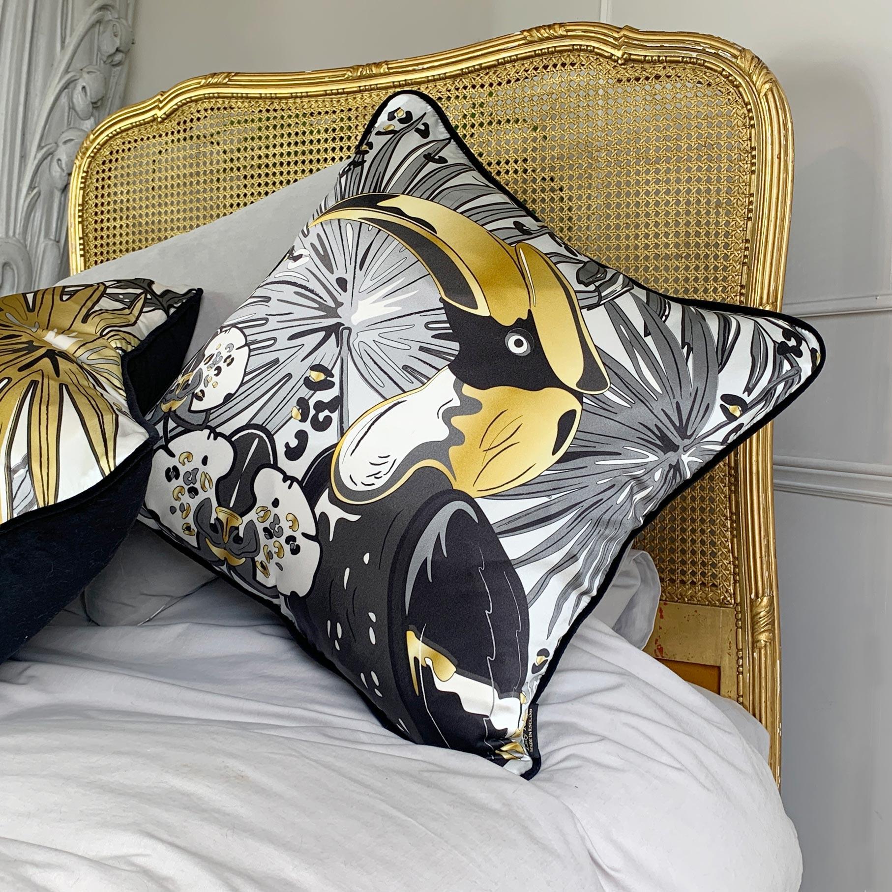 Immerse yourself in a sub-tropical paradise with the luxurious silk 'Hornbill' cushion from our Tropics range

This evocative 100% silk cushion has a rich cotton velvet back and piped edge 

Inspired by large lush jungles and the exotic birds that