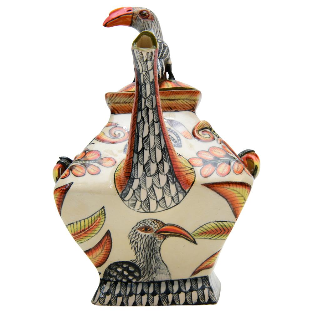 Hornbill Teapot by Ardmore Ceramics. Hand sculpted by Octavia Mazibuko and hand painted by Rosemary Mazibuko in South Africa. Measuring 10 inches high 8 inches in length and 6 inches in width.

Each Ardmore ceramic piece is a collaborative process.