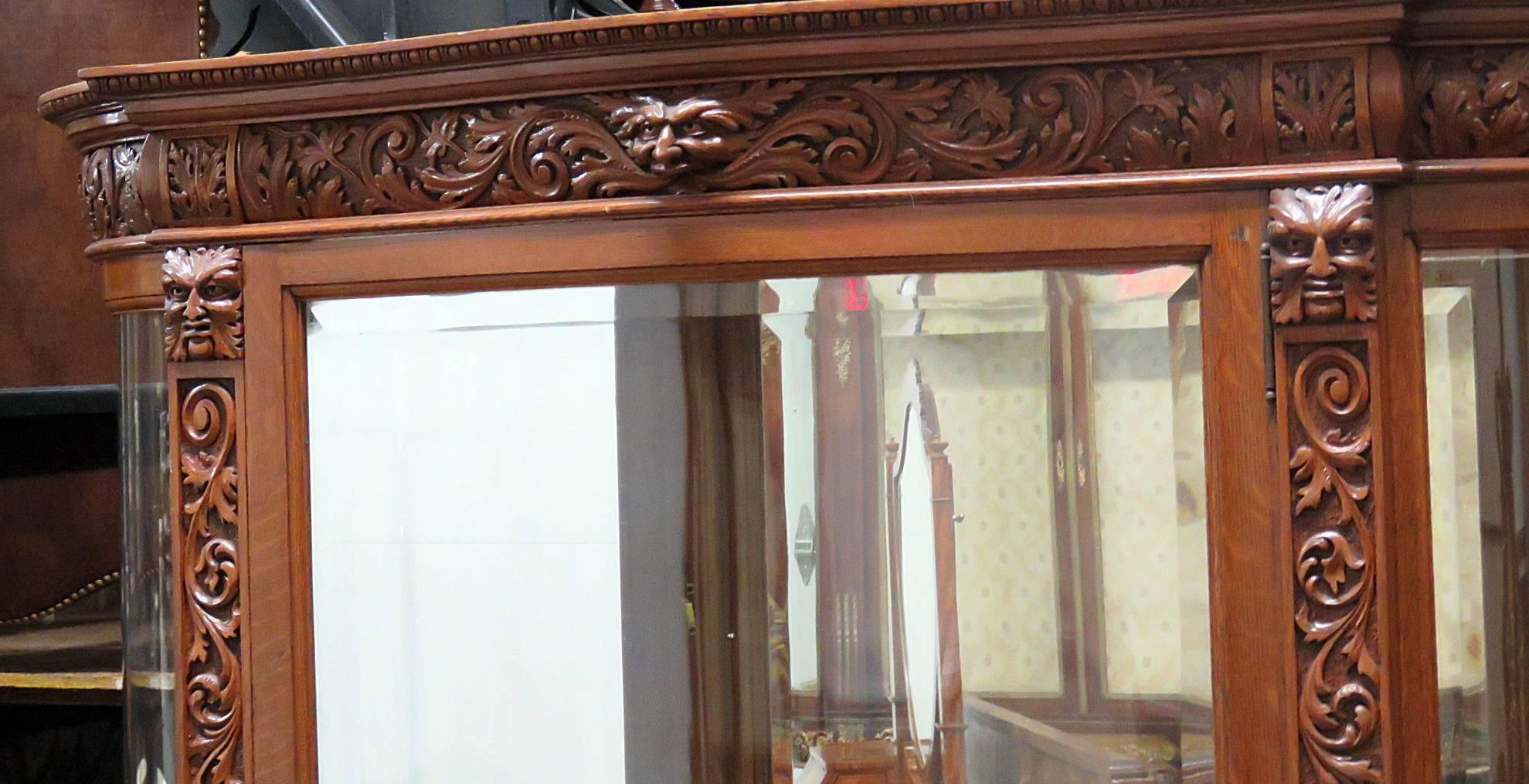 Horner style china or display cabinet with North Wind Face on wheels. Shelves are not photographed, but we do have them.