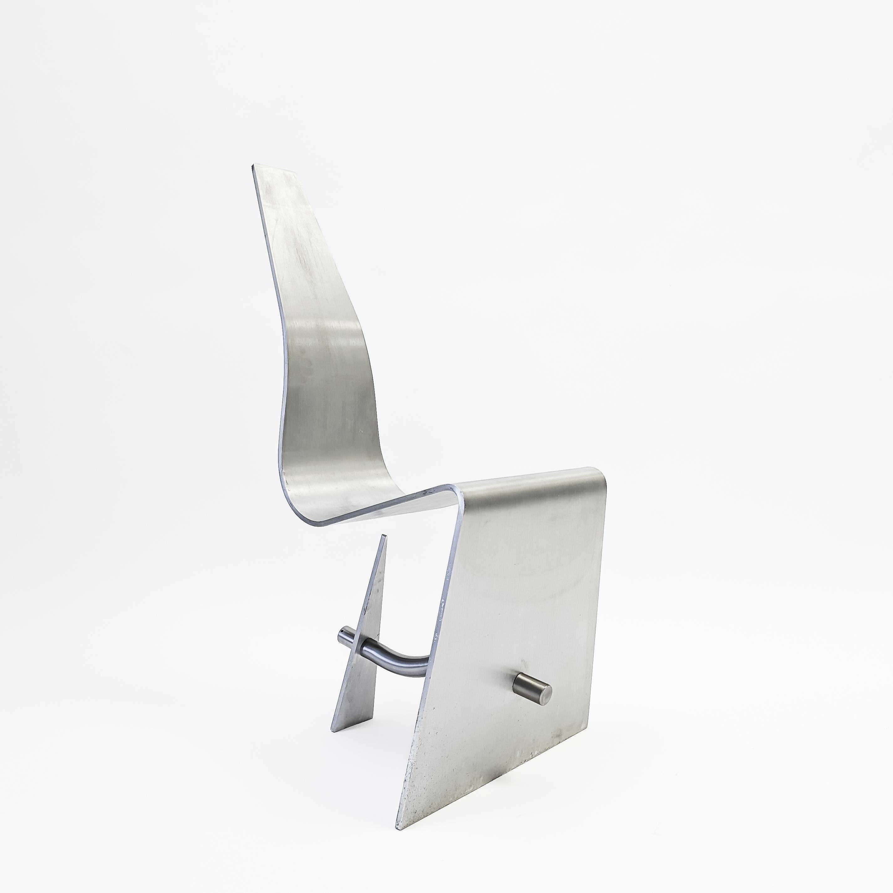 Ron Arad is a renowned architectural designer, artist, and industrial designer who has gained recognition for his innovative designs. His first breakthrough design, the Rover Chair, was created using a Rover car seat and a tubular metal frame. 

The