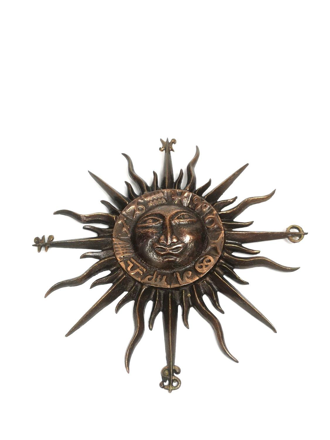 Mid-Century Modern bronze wall plate from the 1960's depicting the sun and the signs of the Zodiac.