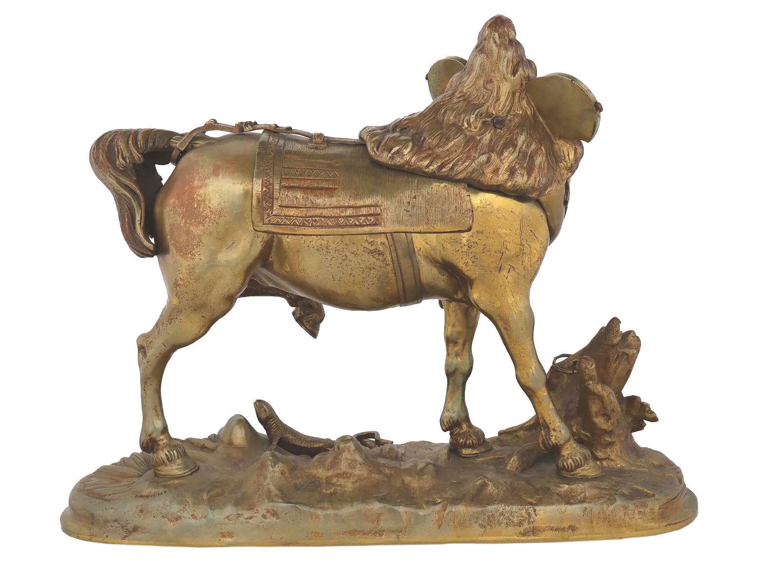 Our charming bronze depicting a horse startled by a lizard after the French artist, Jean-Francois-Theodore Gechter (1796-1844) measures 11.25 in (28.5 cm) tall. Apparently unsigned.

The artist studied with François Joseph Bosio and debuted his