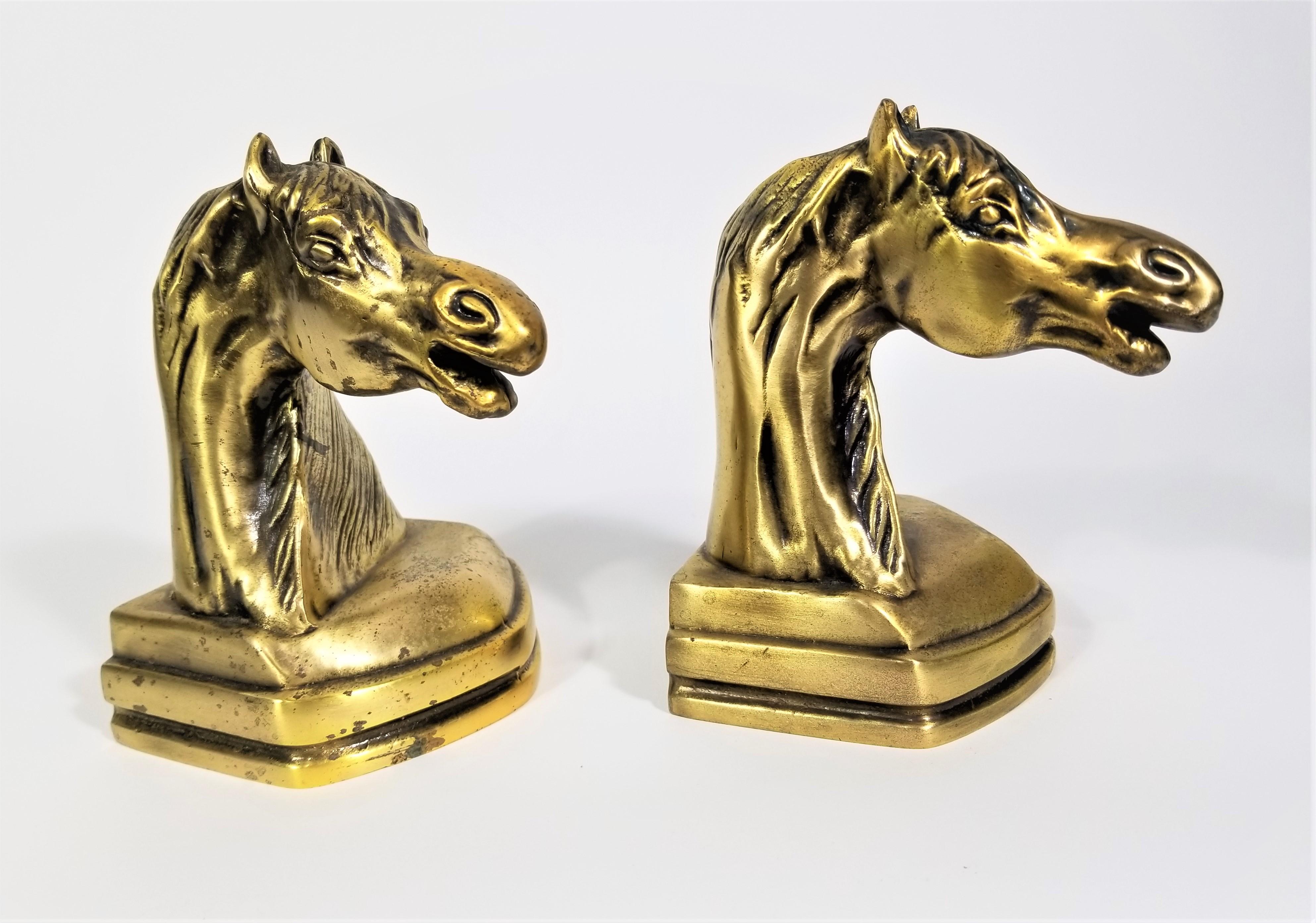 Mid century Horse bookends. Gold brass plated cast iron.