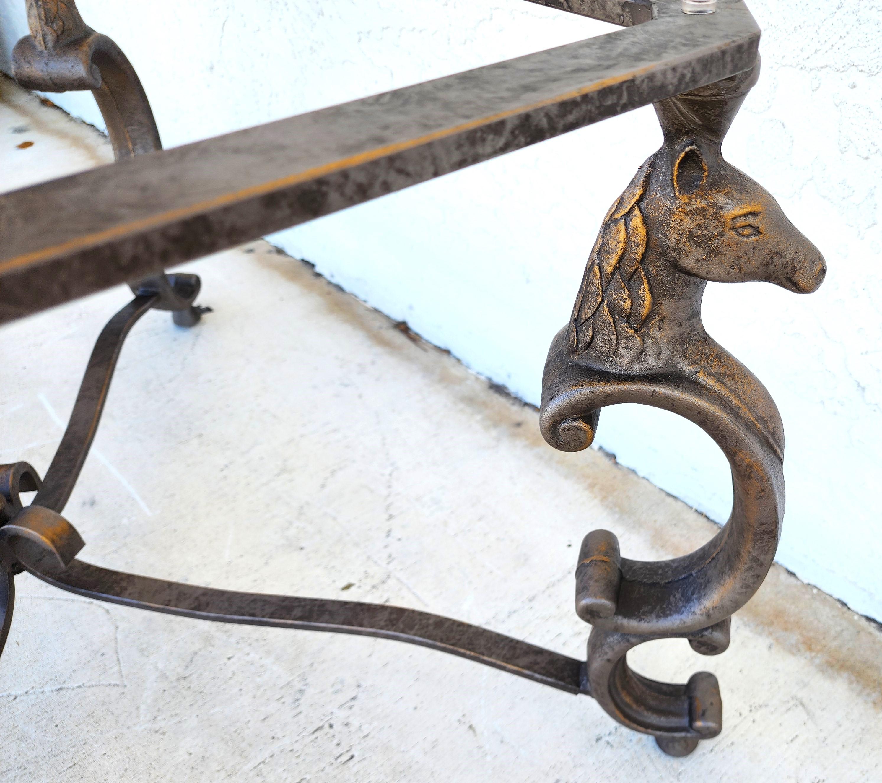 1970s Patinated Steel & Beveled Glass Coffee Table with Horse Heads In Good Condition For Sale In Lake Worth, FL
