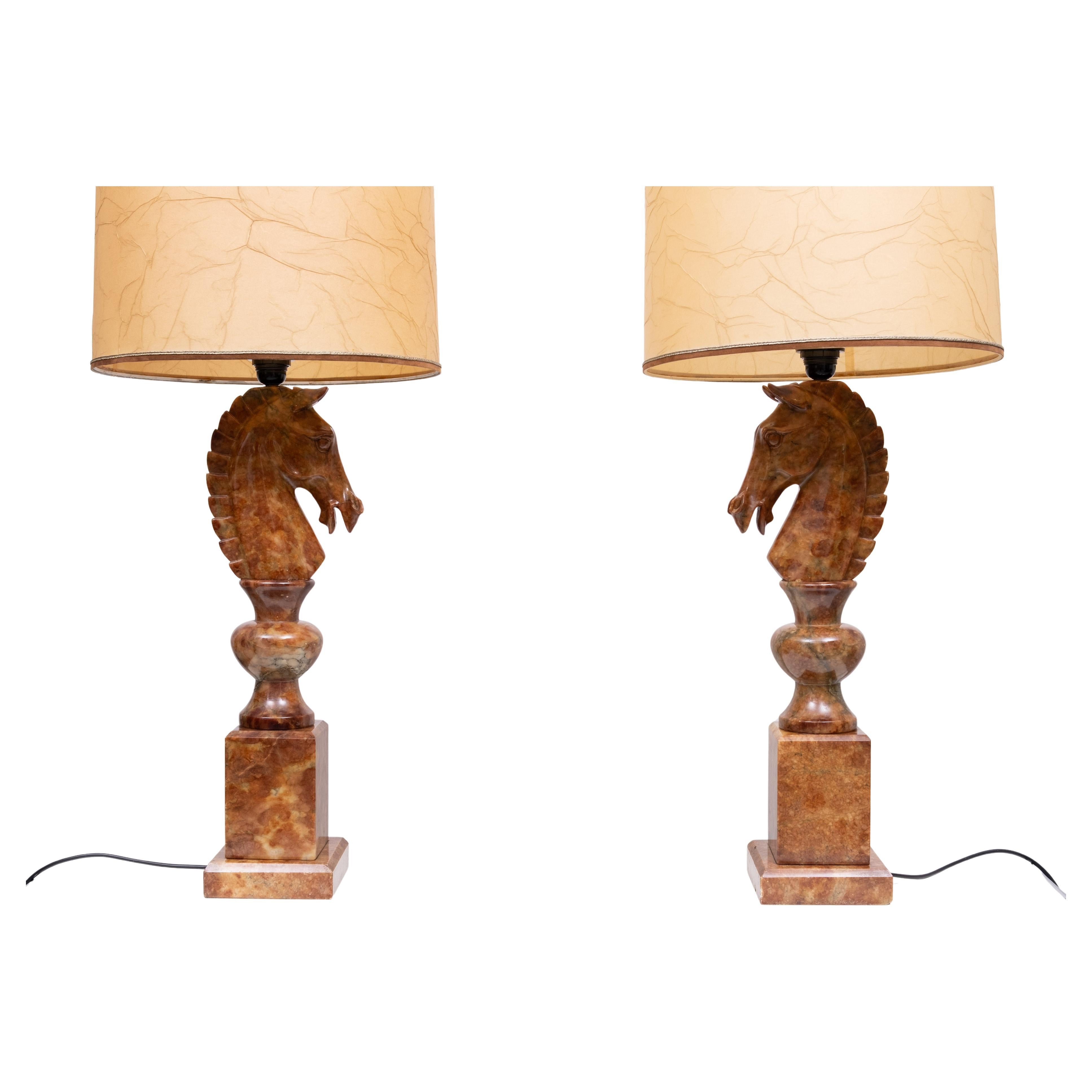 This beathiful  pair of horse head lamps represent knights from a chess set. They are beautifully carved and polished, with a labels stating   ''JIM''  Alabaster Marble Onix Tirrenia  Italy