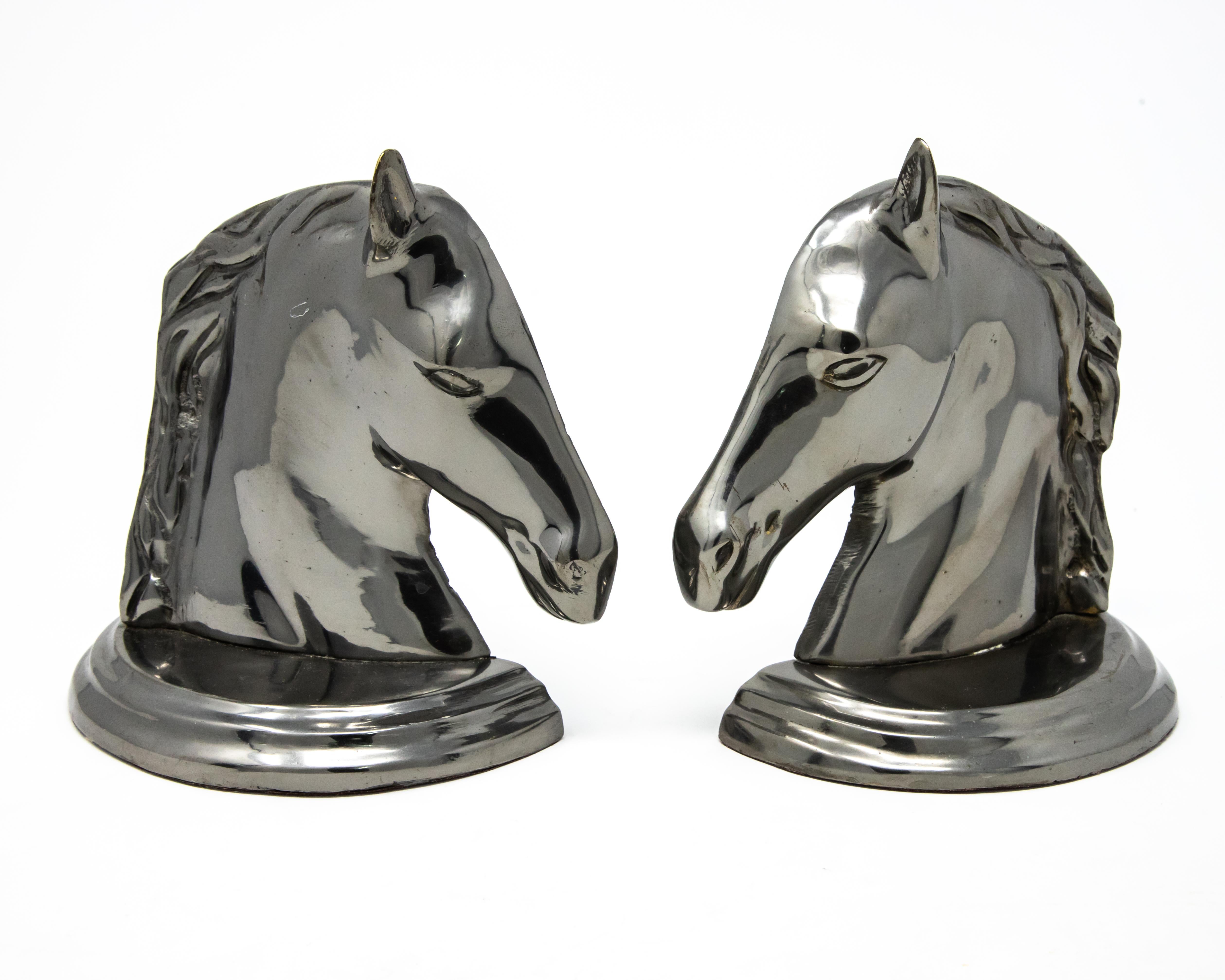 Offering this set of horse head bookends. When the two sides are together it makes a single horse head. They are metal that has be polished.