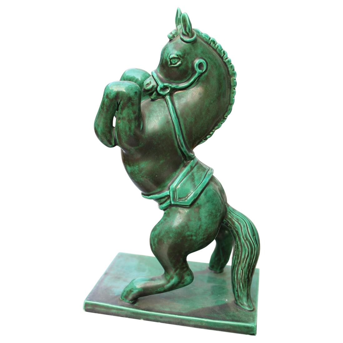 Caballo en cerámica esmaltada verde Zaccagnini Diseño italiano, 1940