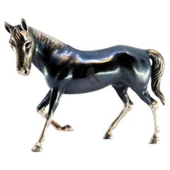Horse in nielada silver in trotting position