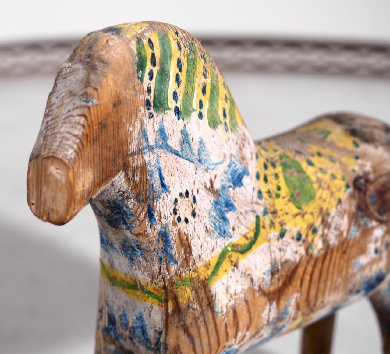 Rare original painted horse, carved in wood and in original paint, 19th century.