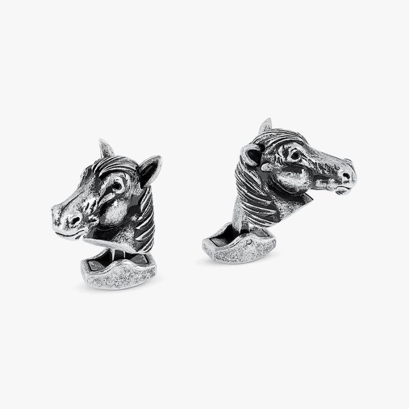 Horse Mechanical Cufflinks with Black Swarovski Elements

Our quirky Horse cufflinks incorporate movement found in the real life animal. The ears and mouth move by touch and a subtle sparkle of black-coloured Swarovski elements are found in the